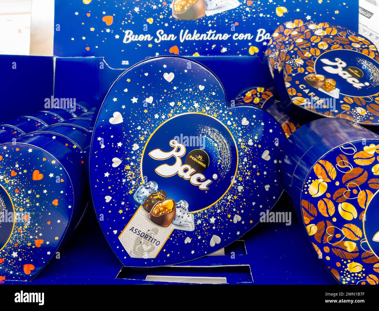 Alba, Italy - February 27, 2024: Baci Perugina chocolates in heart-shaped confections for Valentine's Day displayed for sale in Italian supermarket Stock Photo