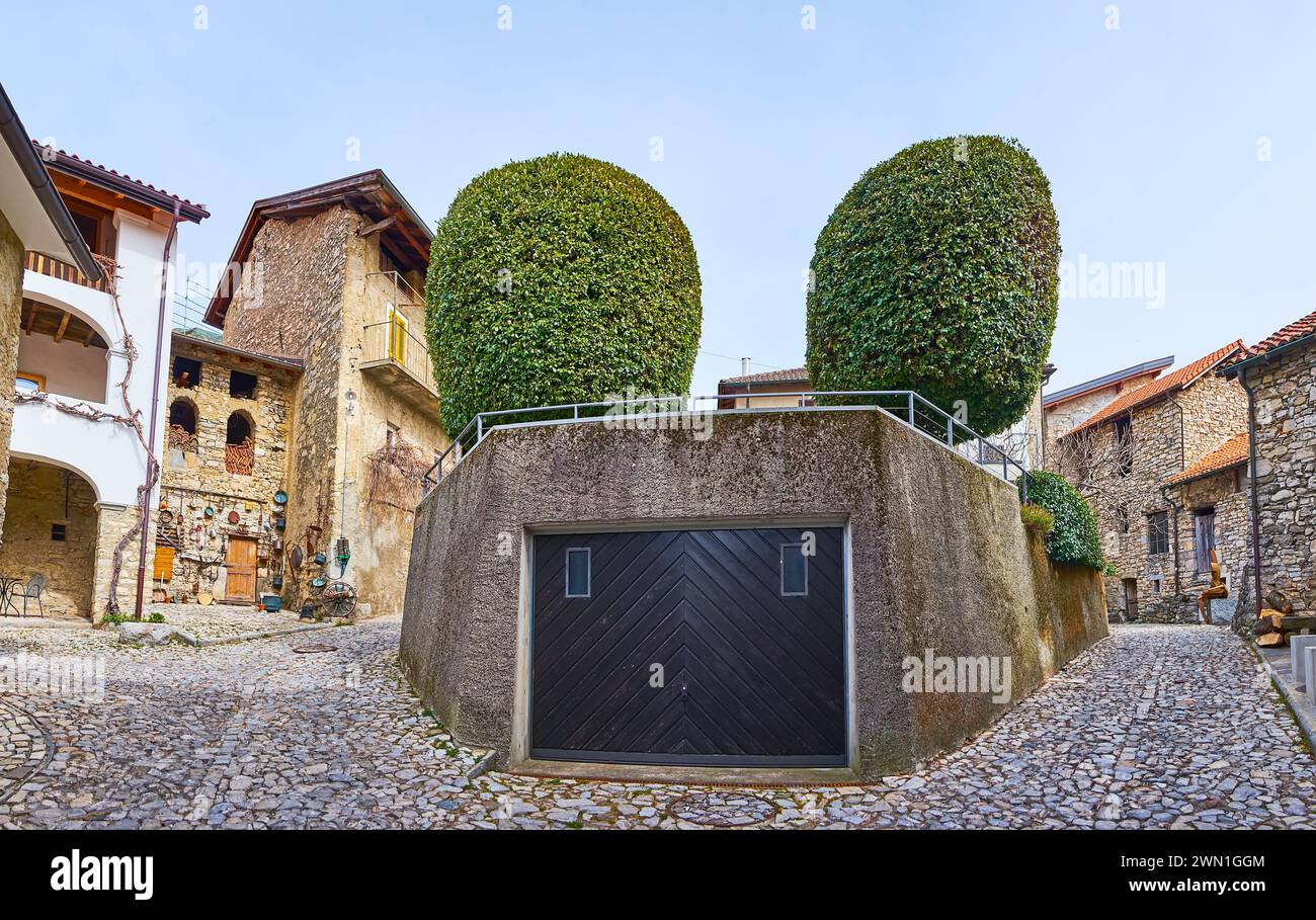 The stone streets and residential houses of small mountain village of ...