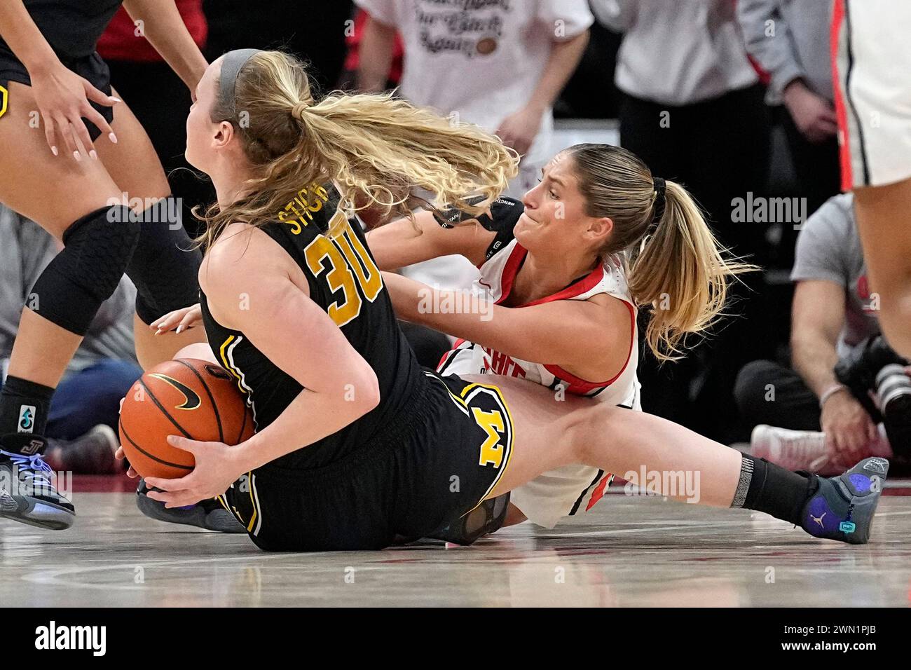 Ohio State guard Jacy Sheldon, right, reaches for the ball held by