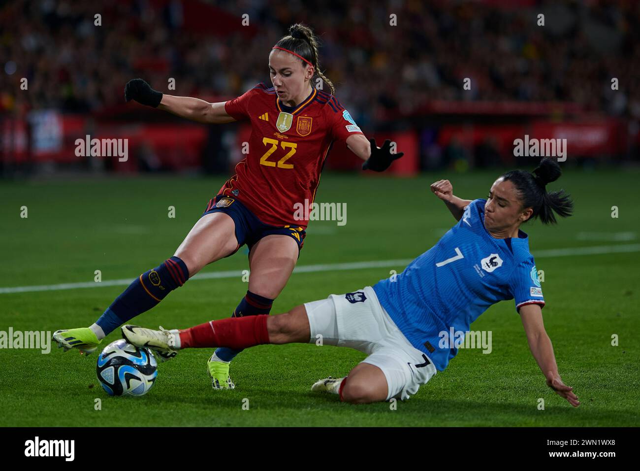 Seville. 28th Feb, 2024. Athenea del Castillo (L) of Spain vies with