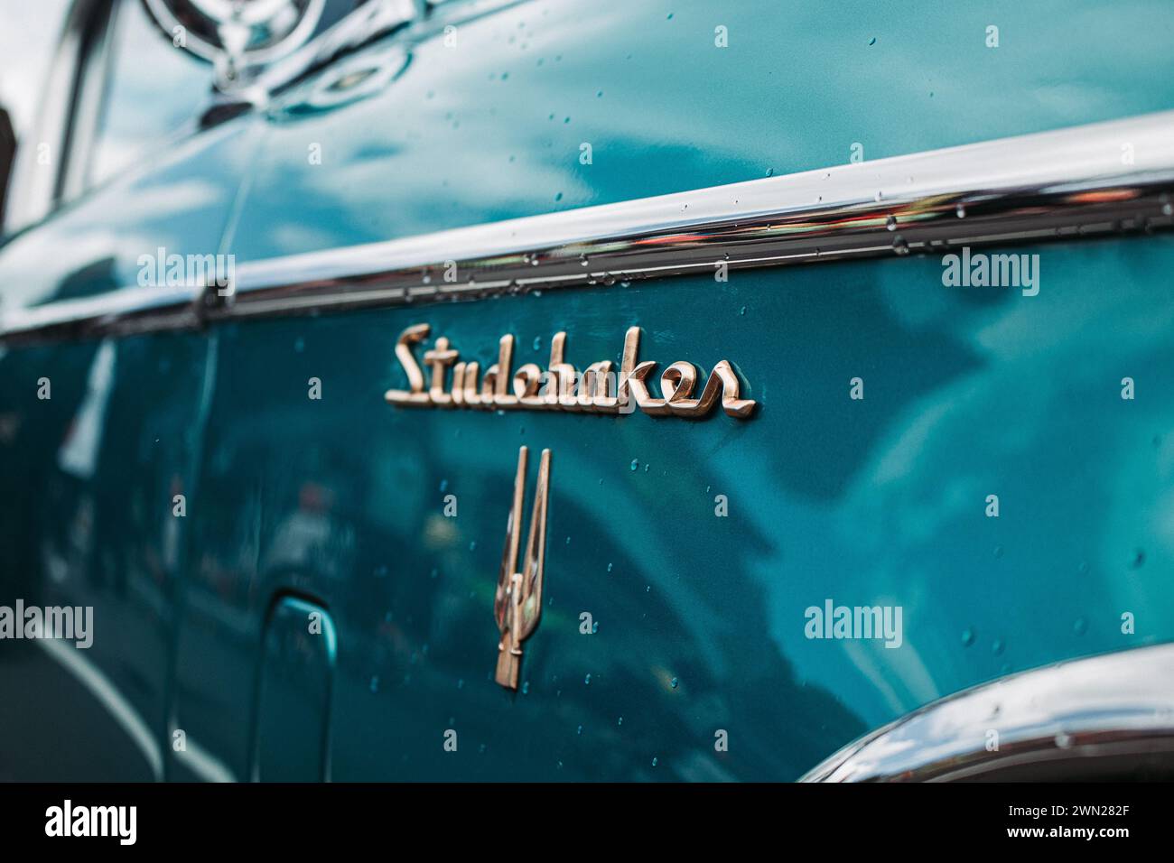 Thames, New Zealand, 24 November 2022, Beach Hop Car Rally: Detail shot - Restored Vintage teal / turquoise Studebaker with raindrops. Stock Photo