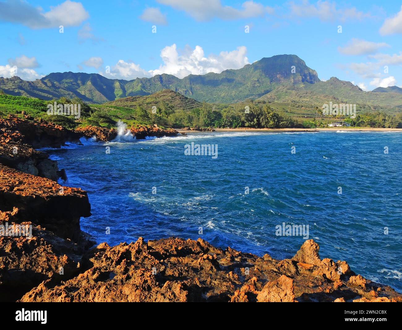 Spectacularly-eroded coastline and surf at shipwreck beach along the ...