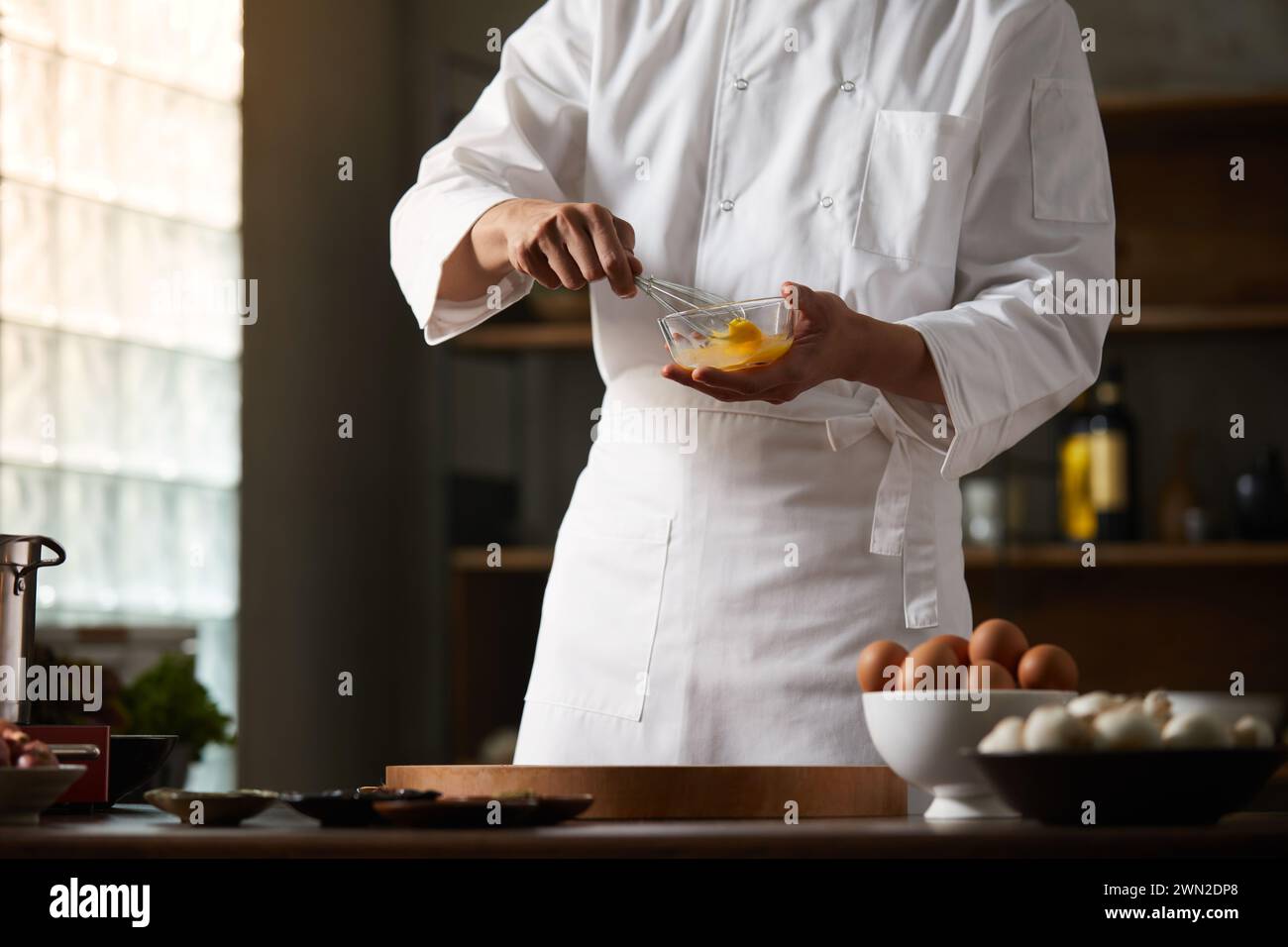 Cook making dishes in the kitchen Stock Photo