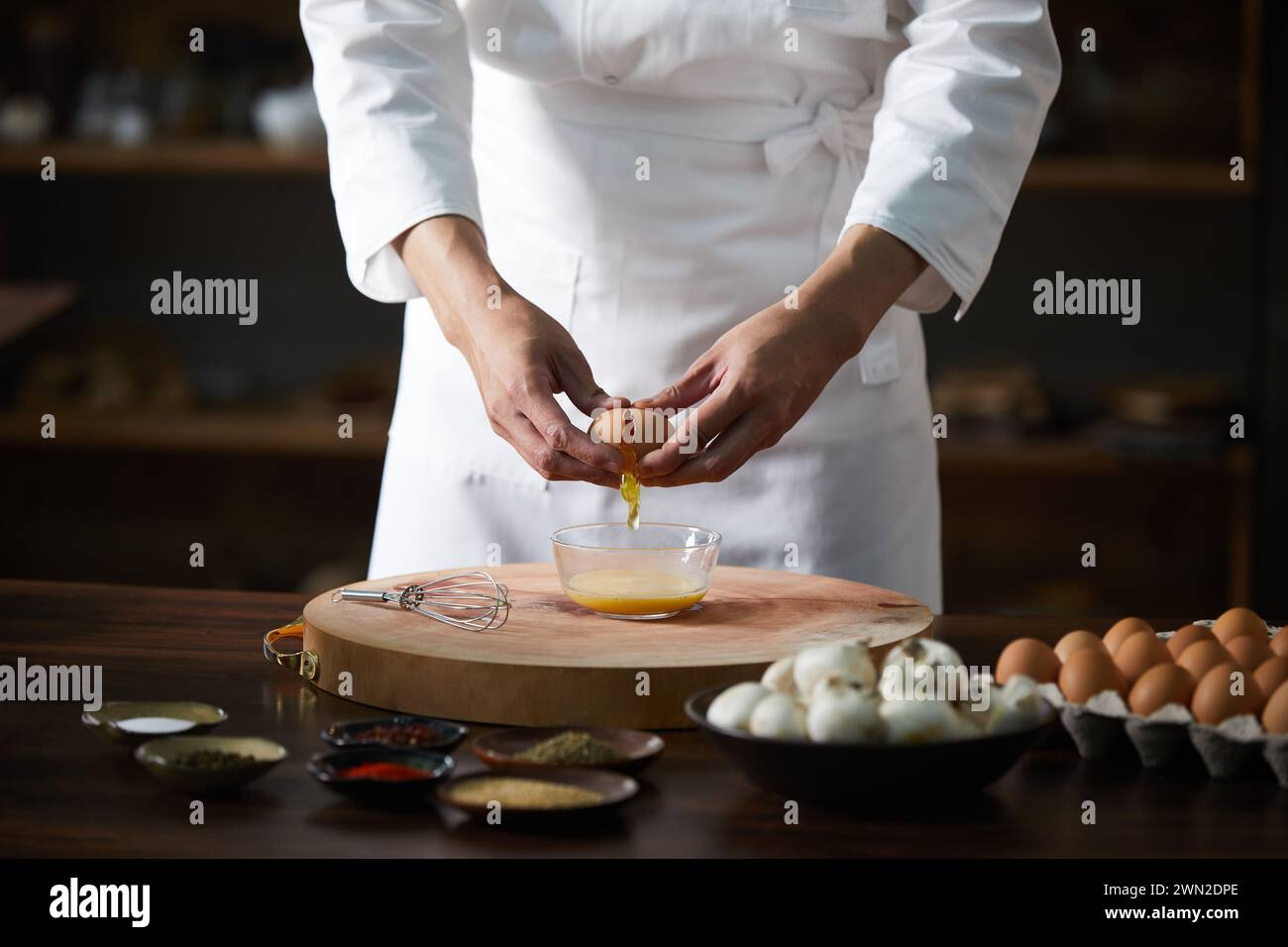 Cook making dishes in the kitchen Stock Photo - Alamy