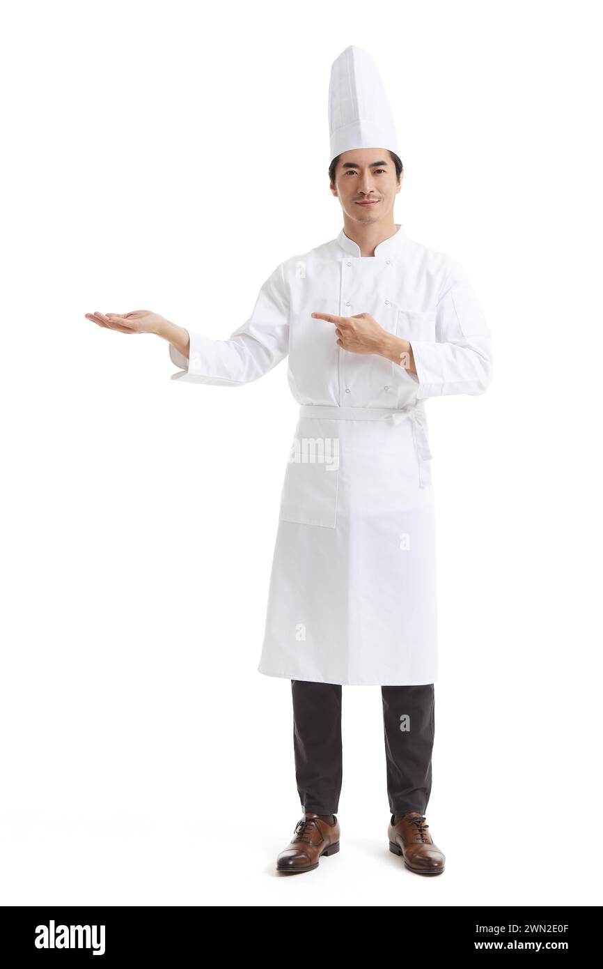 Chef making introducing gesture Stock Photo