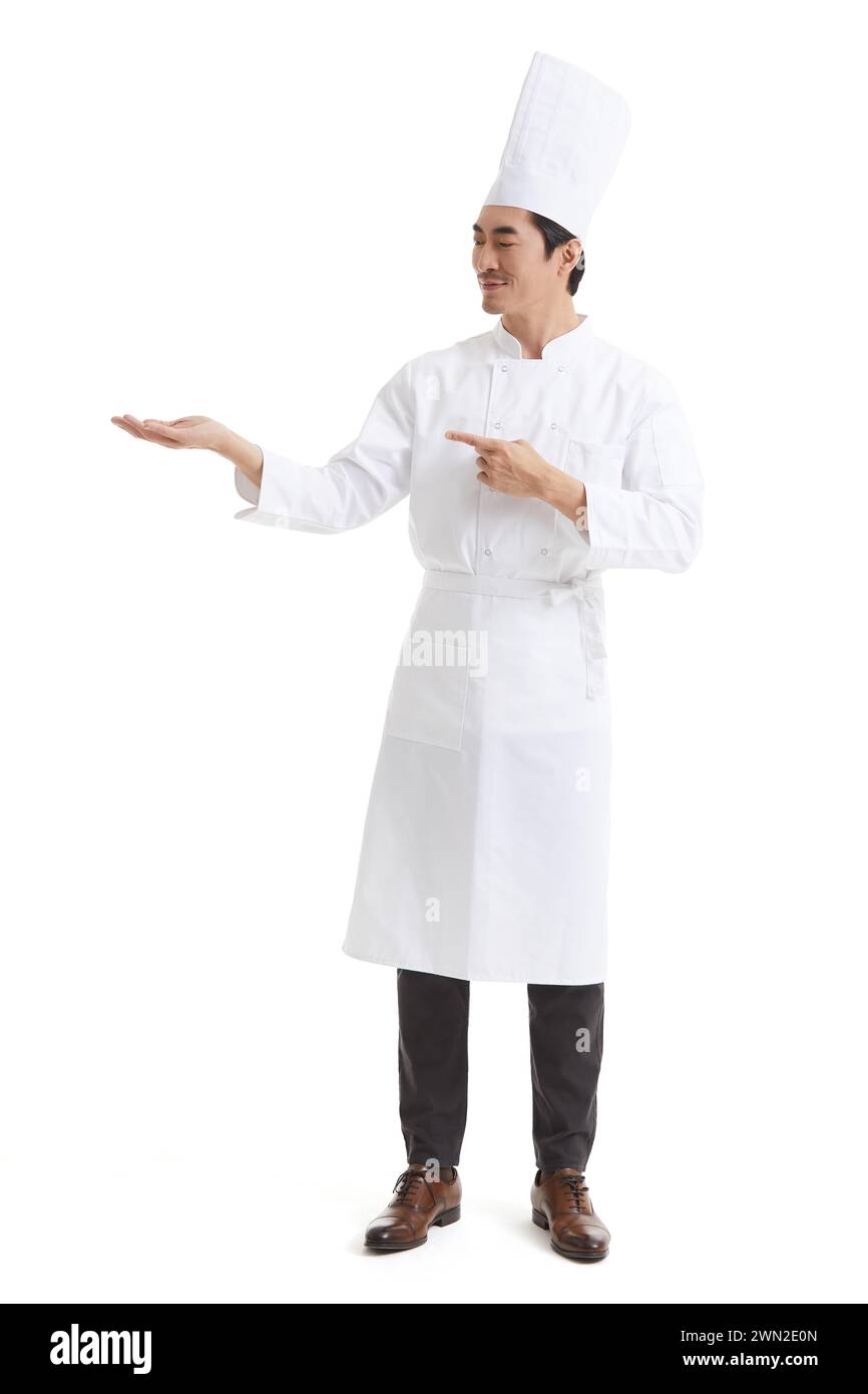 Chef making introducing gesture Stock Photo