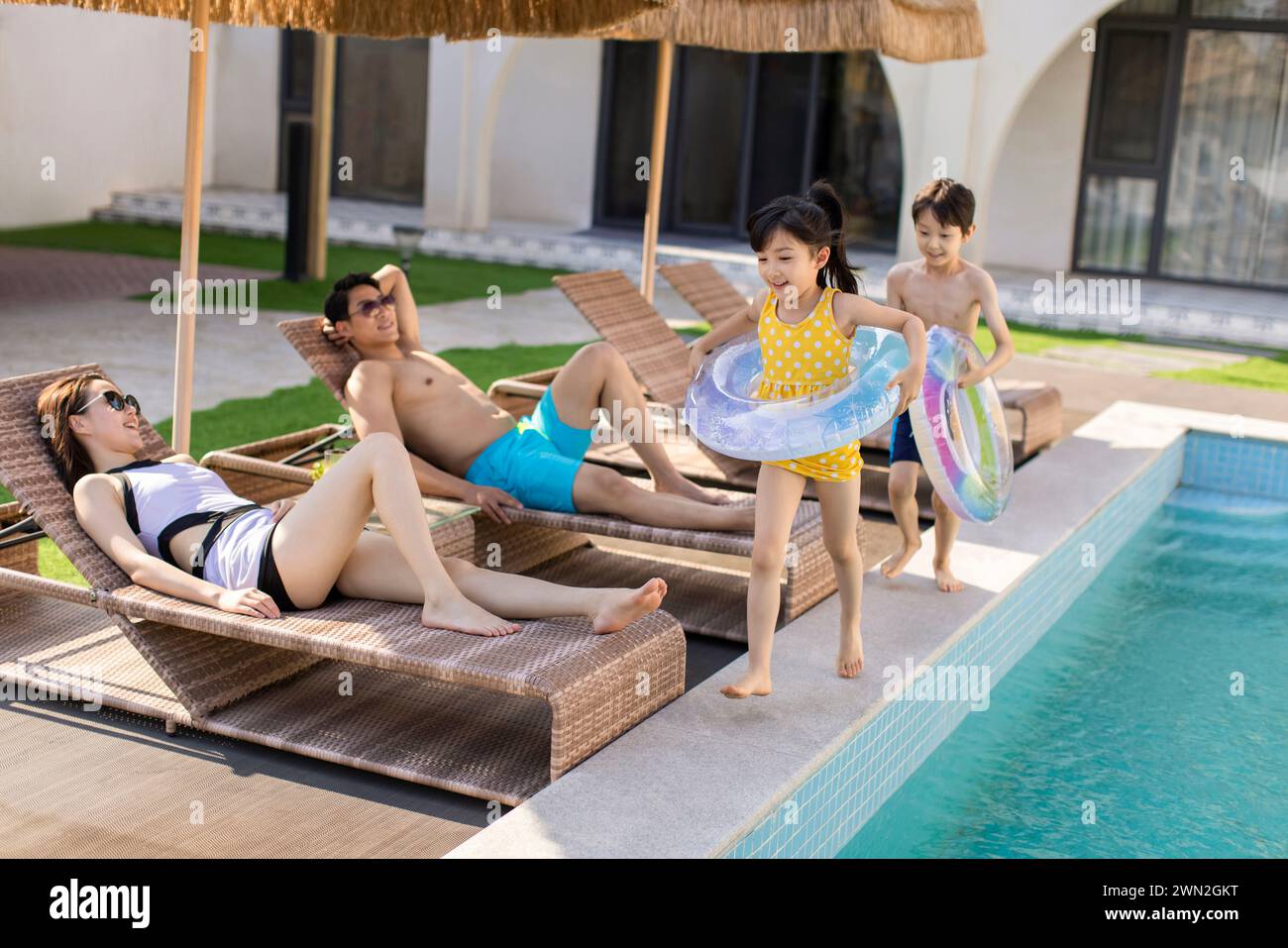 Happy young family on vacation Stock Photo