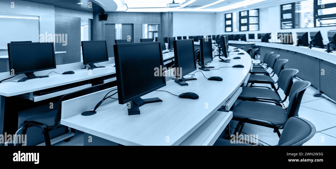 Group of computers in computer lab Stock Photo - Alamy