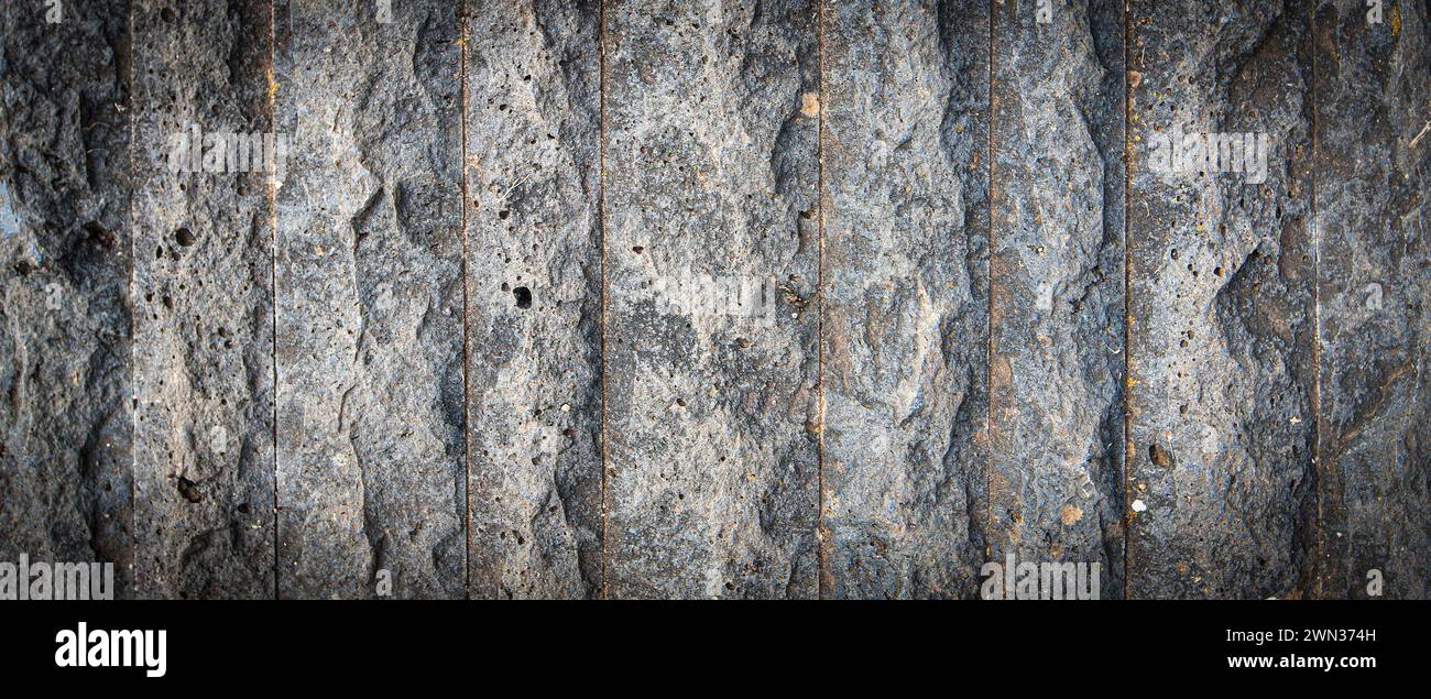 The Granite cobblestoned pavement background. Selective focus Stock Photo