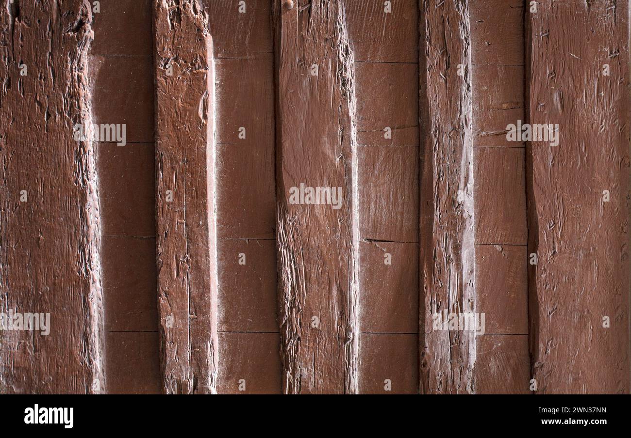 The Rustic brown wooden window shutters with stone wall Stock Photo - Alamy