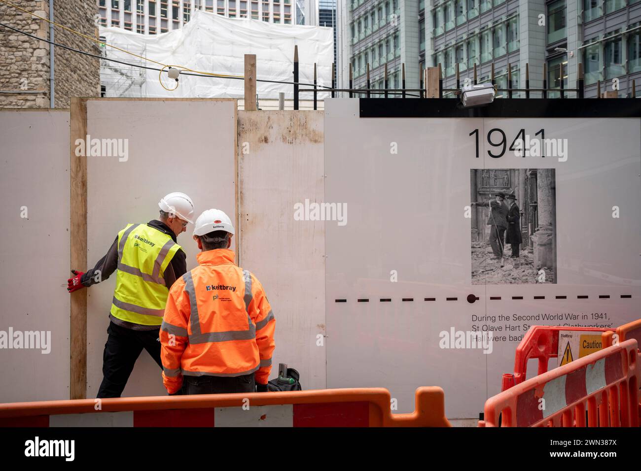 Contractors Complete A Protective Hoarding That Shows Historical Dates contractors-complete-a-protective-hoarding-that-shows-historical-dates