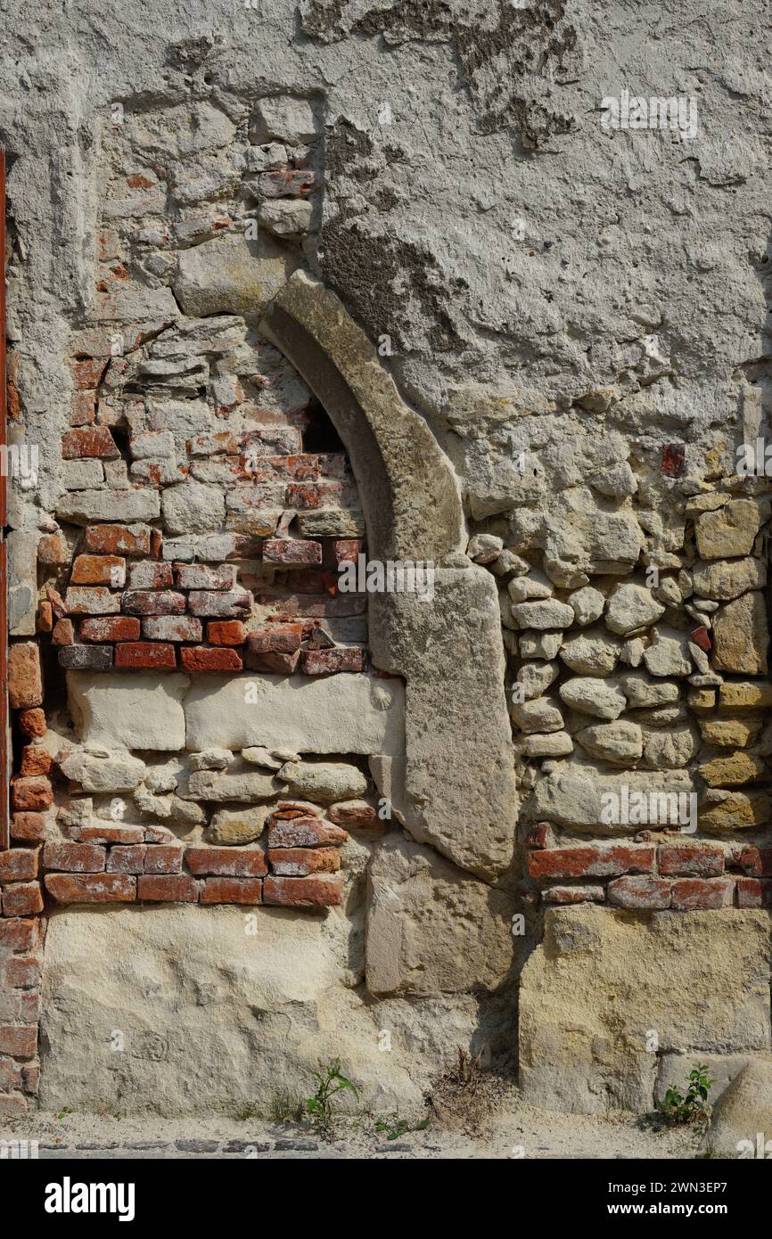 An old brick wall with rugged surface Stock Photo