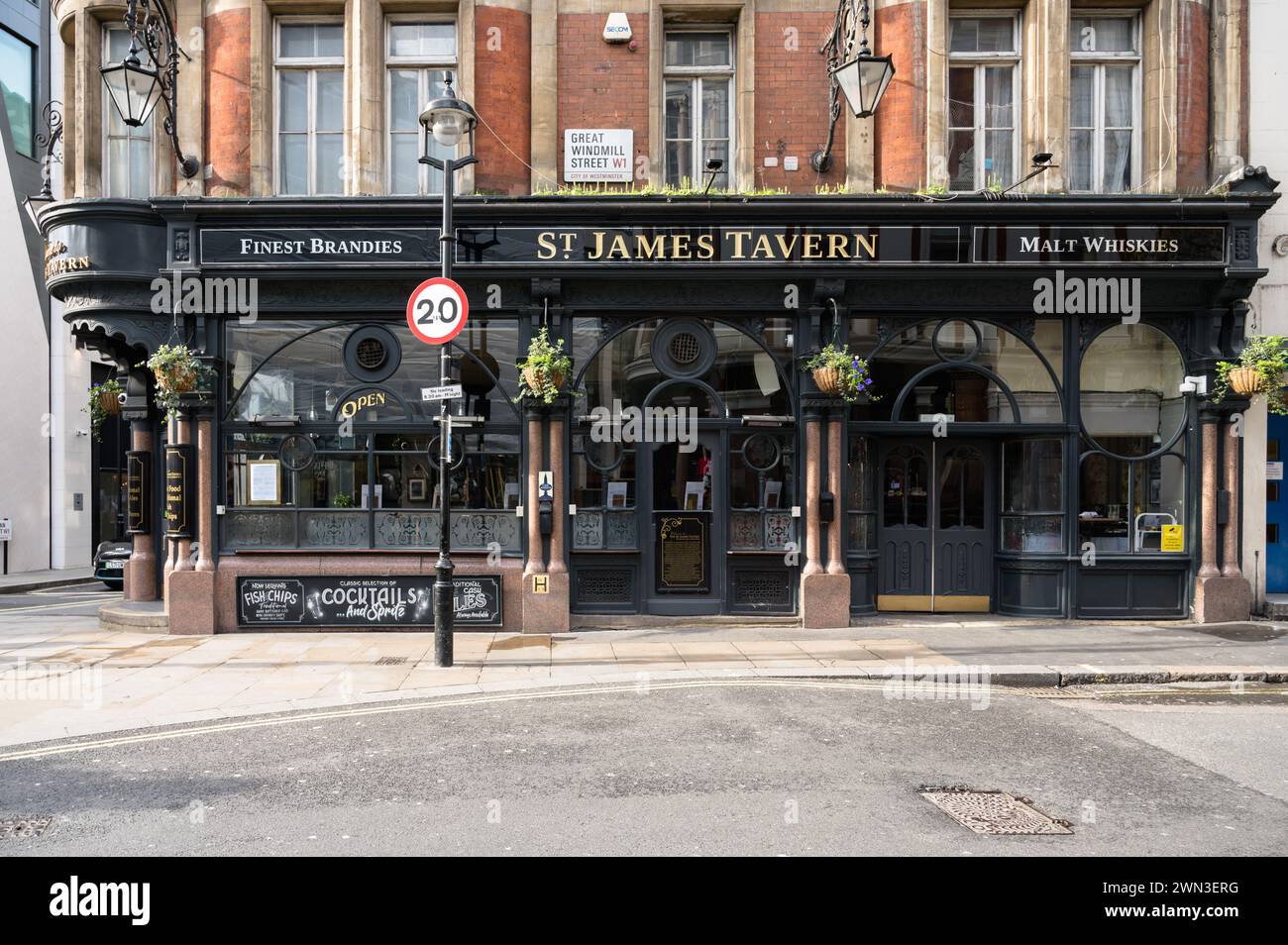 St James Tavern, a traditional pub at the corner of Great Windmill Street and Denman Street Soho London UK Stock Photo