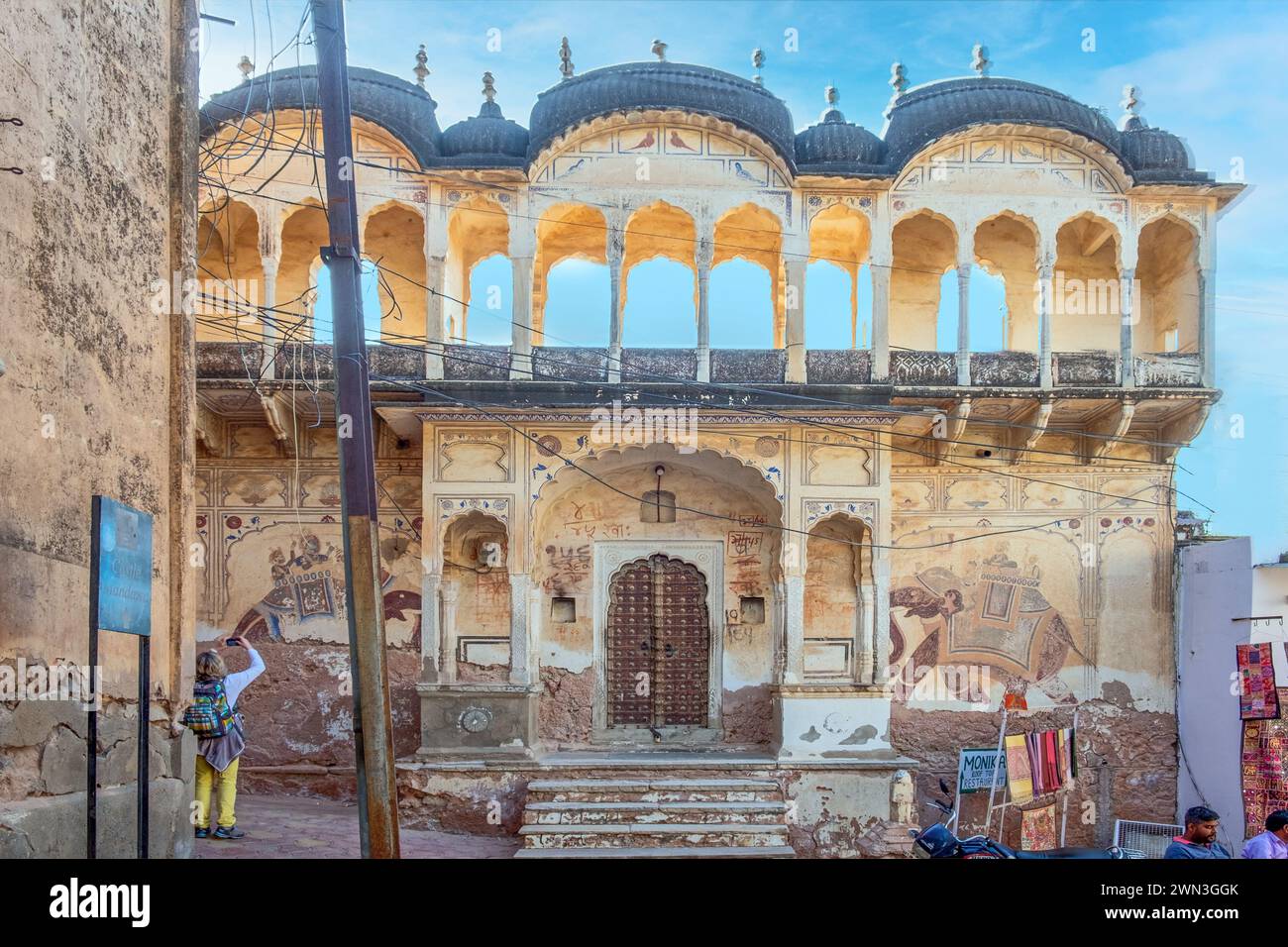 Mandawa, India - February 10, 2024: scenic Haweli in Mandawa with colorful mural paintings and typical indian arch style architecture houses a roof to Stock Photo