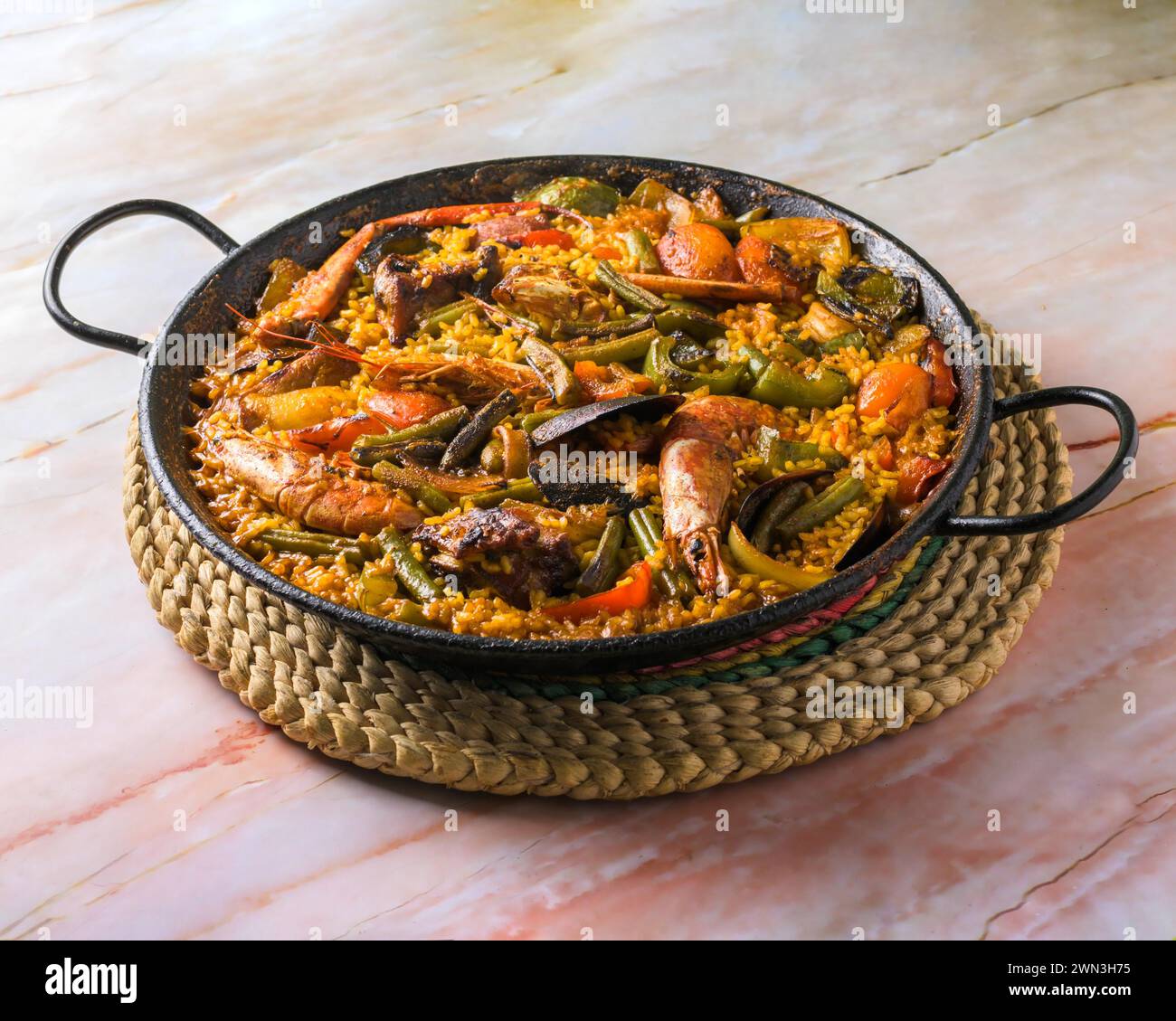 Isolated view of paella mixta, typical spanish food, mediterranean gastronomic culture, mallorca, balearic islands, spain Stock Photo