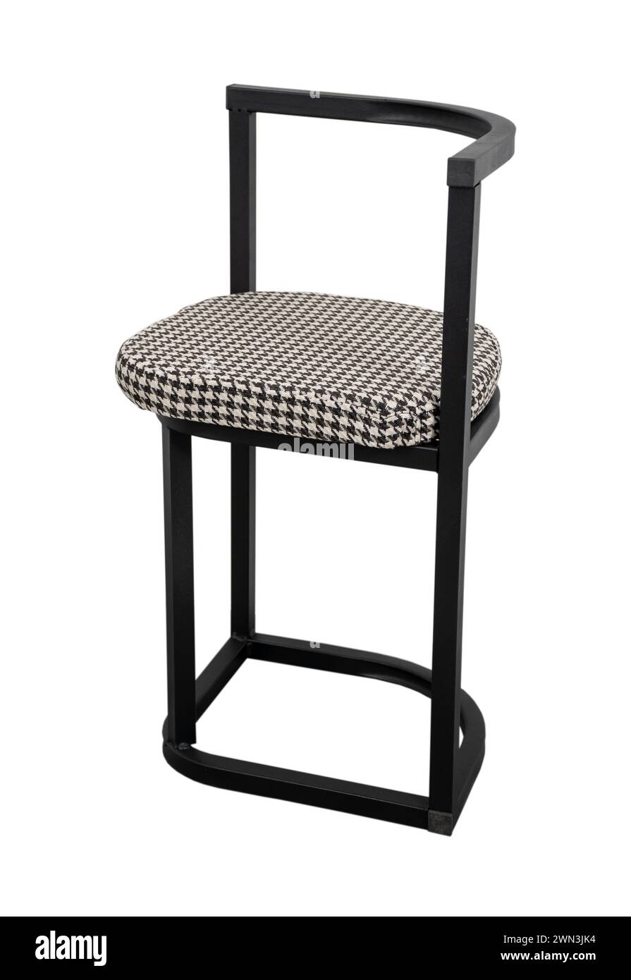 Monochrome chair with houndstooth fabric Stock Photo