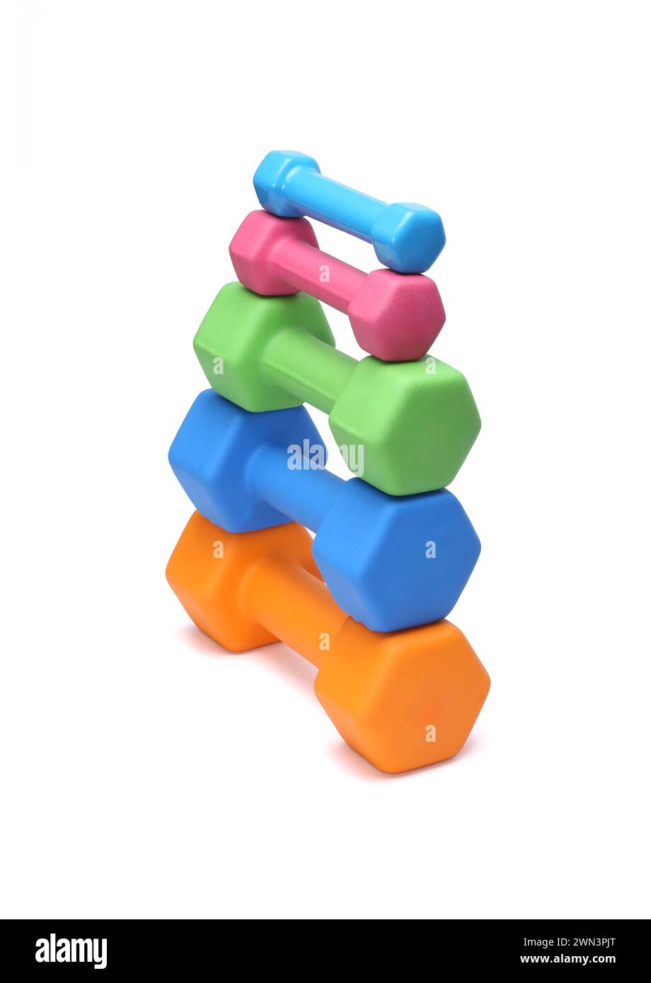 colorful rubber coated dumbbells isolated on white background Stock Photo