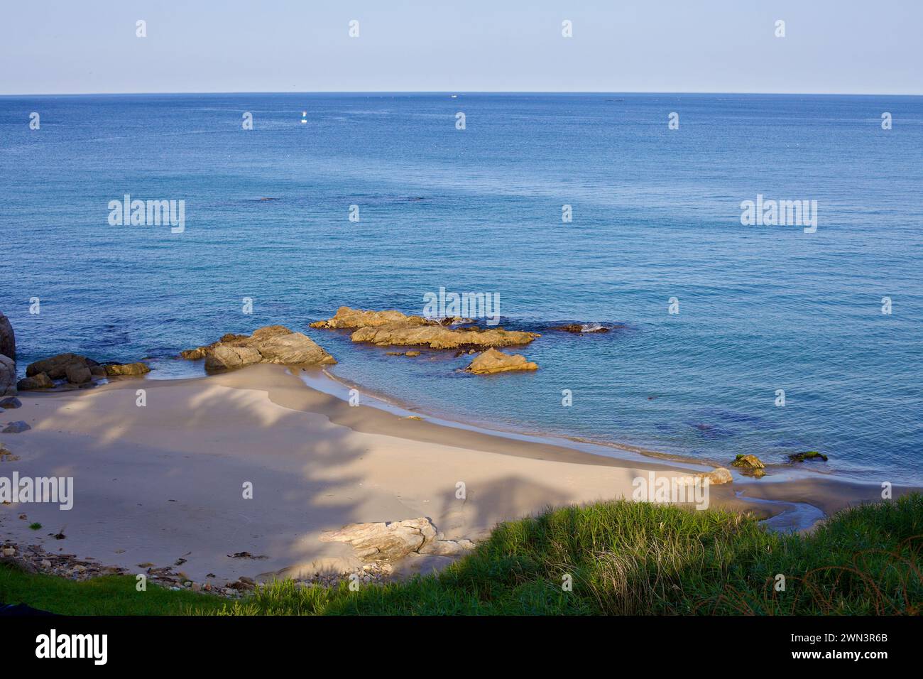 Korean Beach Rocks Yangyang County, South Korea - July 30th, 2019: A peaceful sand bank ...