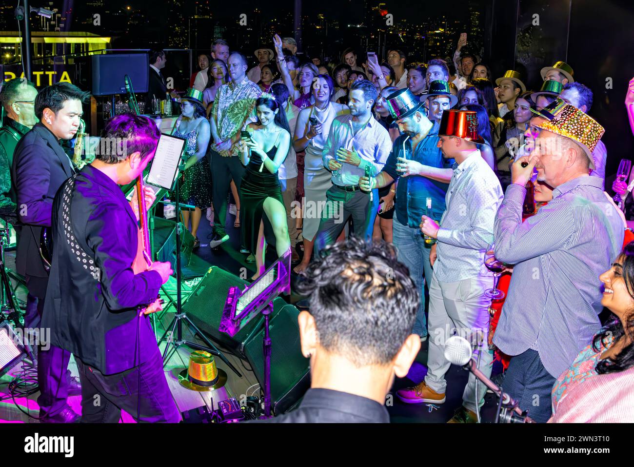 Dancers and live music at New Years Eve party at rooftop Red Sky Bar 56, Centara Hotel, Bangkok, Thailand Stock Photo