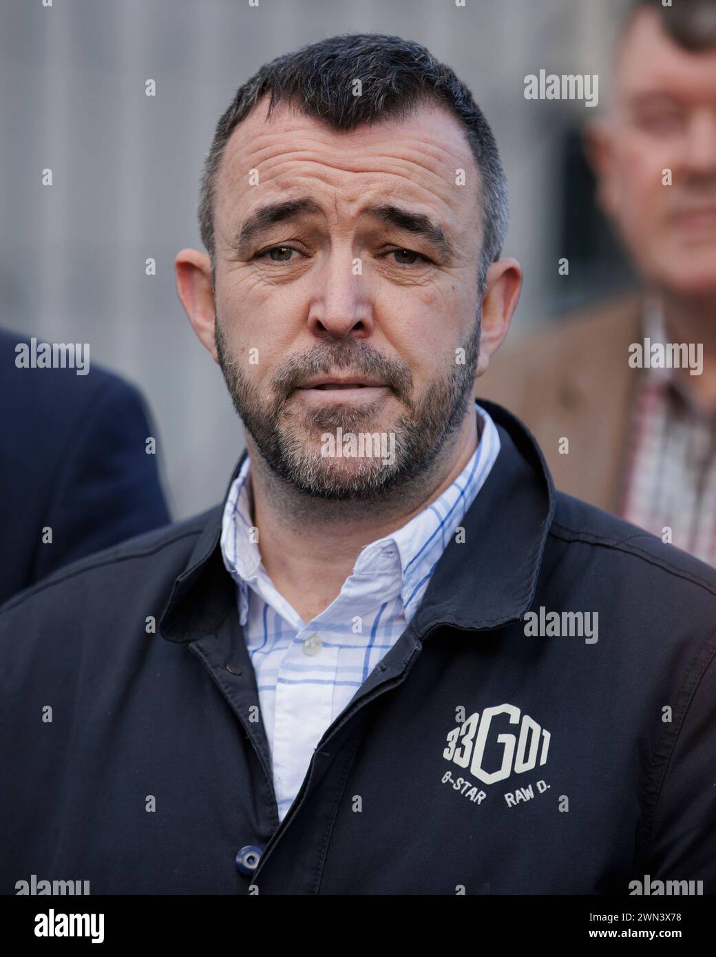 Kieran Fox (third from left), son of Eamon Fox, outside Belfast Crown