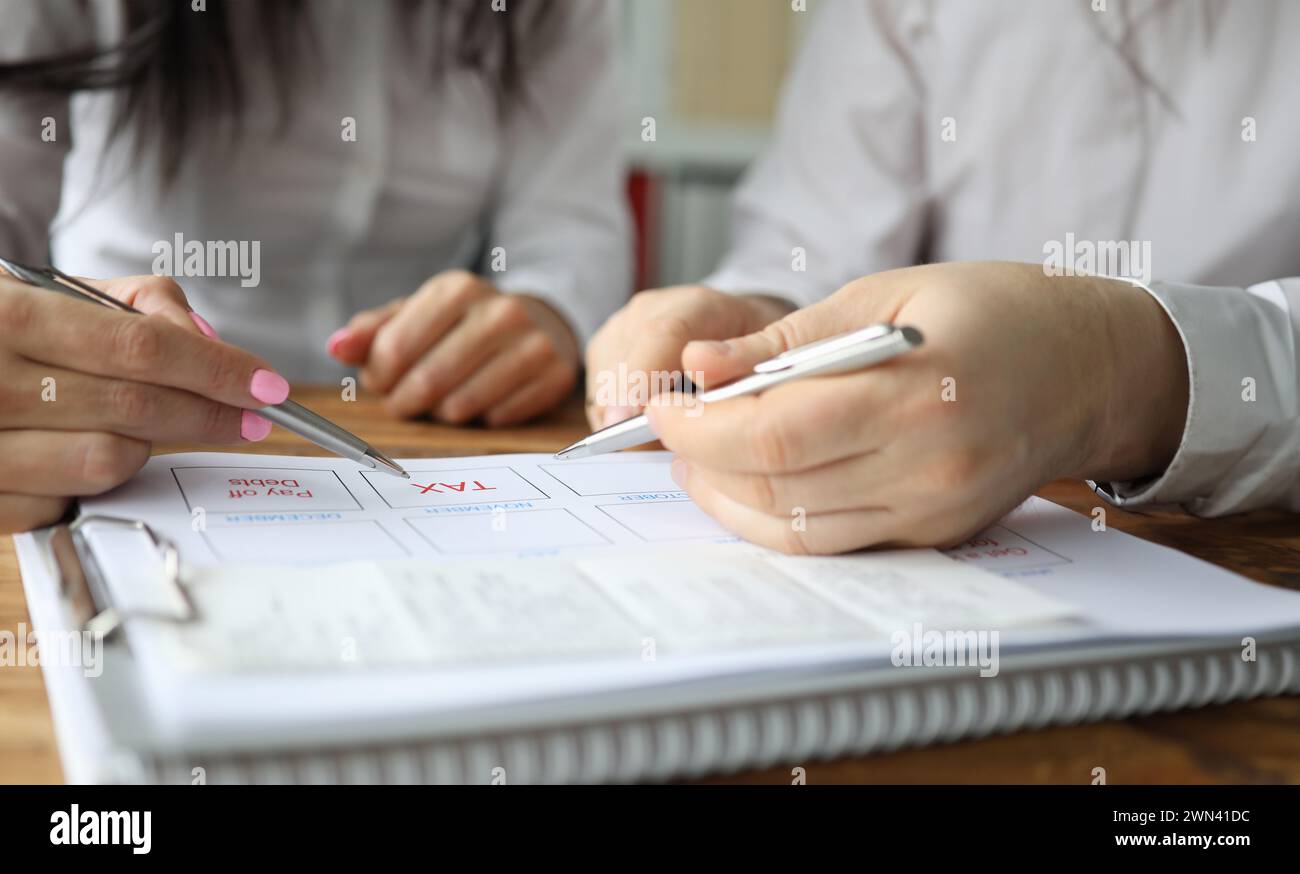 Hand people fill out plan budget financial payment Stock Photo