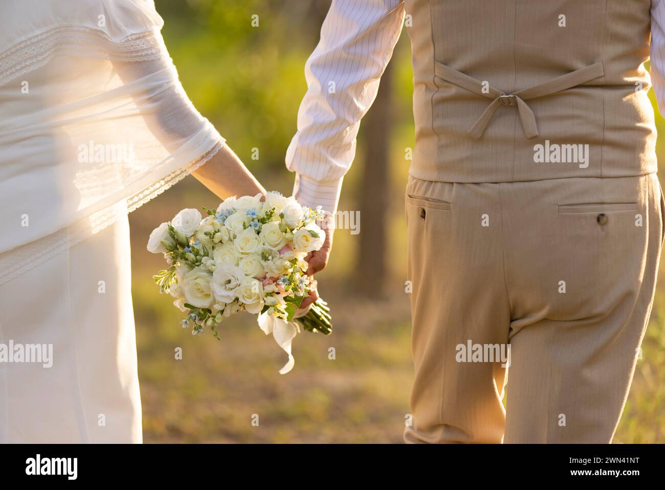Indian bride holding bouquet hi-res stock photography and images - Alamy