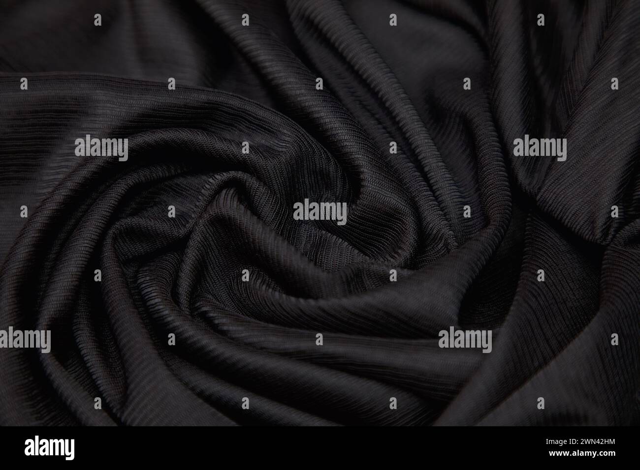 Black textured silk abstract background Stock Photo