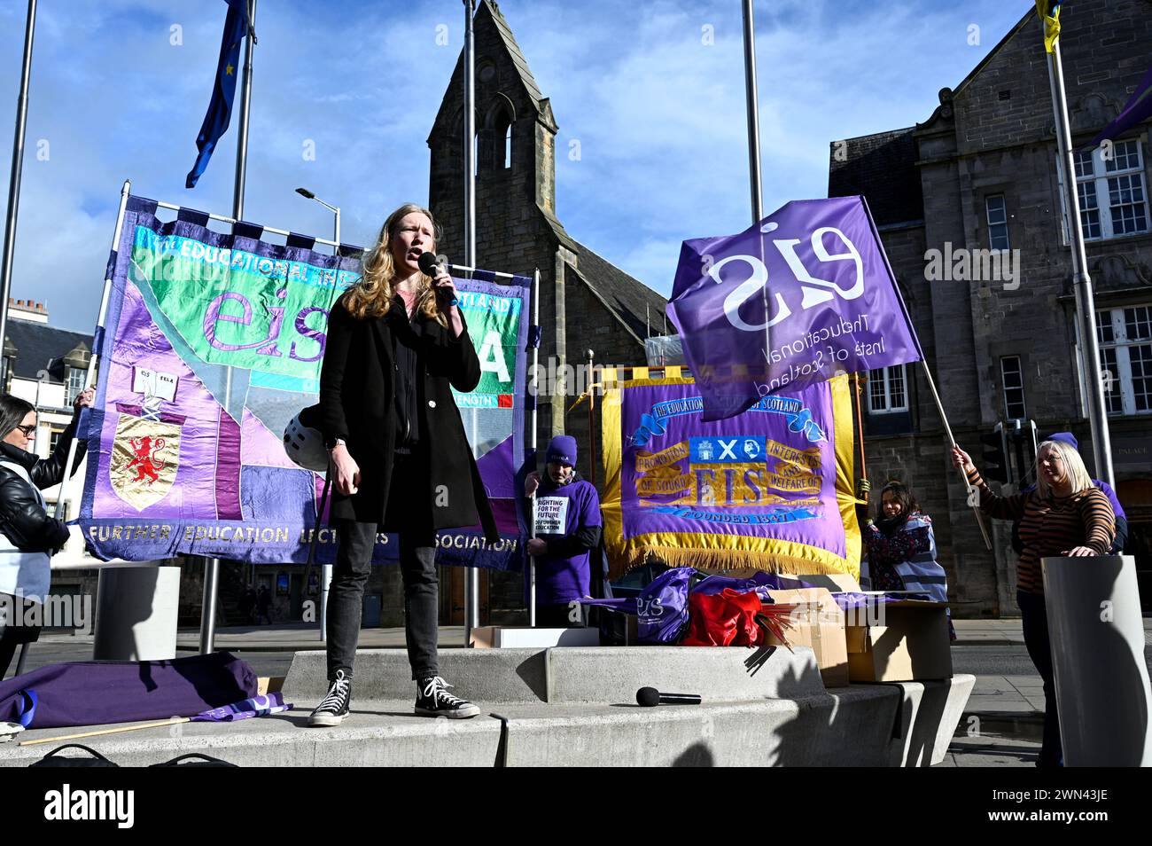 Edinburgh, Scotland, UK. 29th February 2024.  Rally by EIS FELA and Unison protesting against the planned funding cuts to further education and for a fair pay rise, protest at the Scottish parliament Holyrood. President of NUS Scotland, Activist and Scottish Greens campaign manager Ellie Gomersall addressing the crowd. Credit: Craig Brown/Alamy Live News Stock Photo