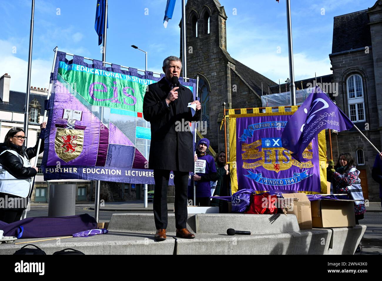 Edinburgh, Scotland, UK. 29th February 2024.  Rally by EIS FELA and Unison protesting against the planned funding cuts to further education and for a fair pay rise, protest at the Scottish parliament Holyrood. Scottish Liberal Democrat MSP Willie Rennie addressing the crowd. Credit: Craig Brown/Alamy Live News Stock Photo