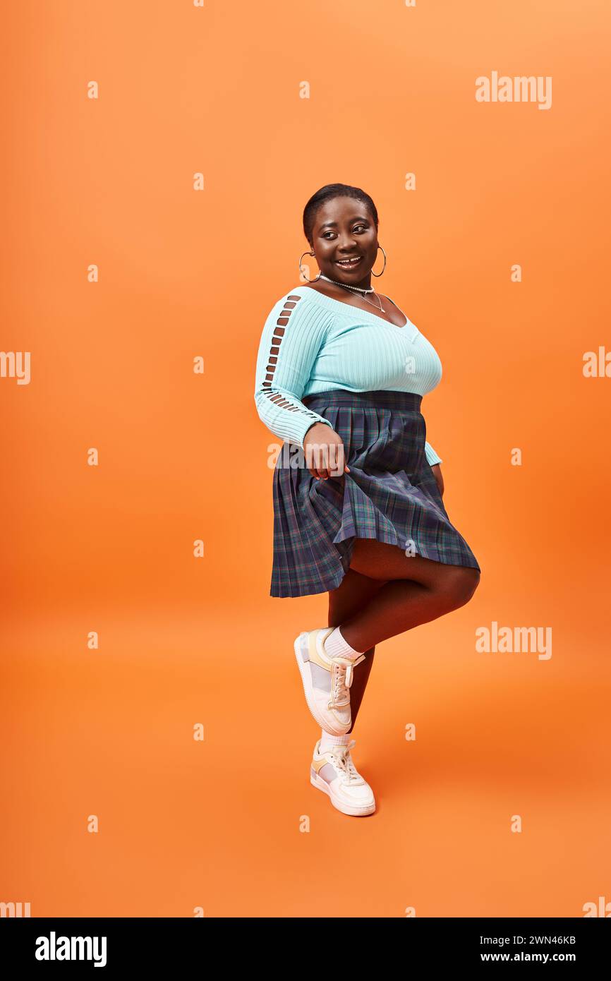 Orange and black skirt hi res stock photography and images Page 3 Alamy