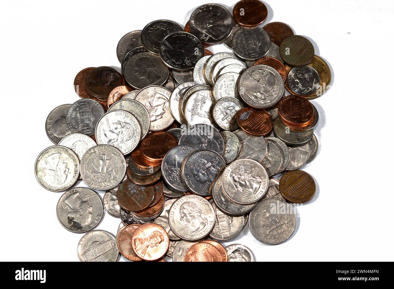 Pile of American coins of 1 cent, 5, 10, 25 cents quarter and one dollar, Vintage retro old American money background, United States of America dollar Stock Photo