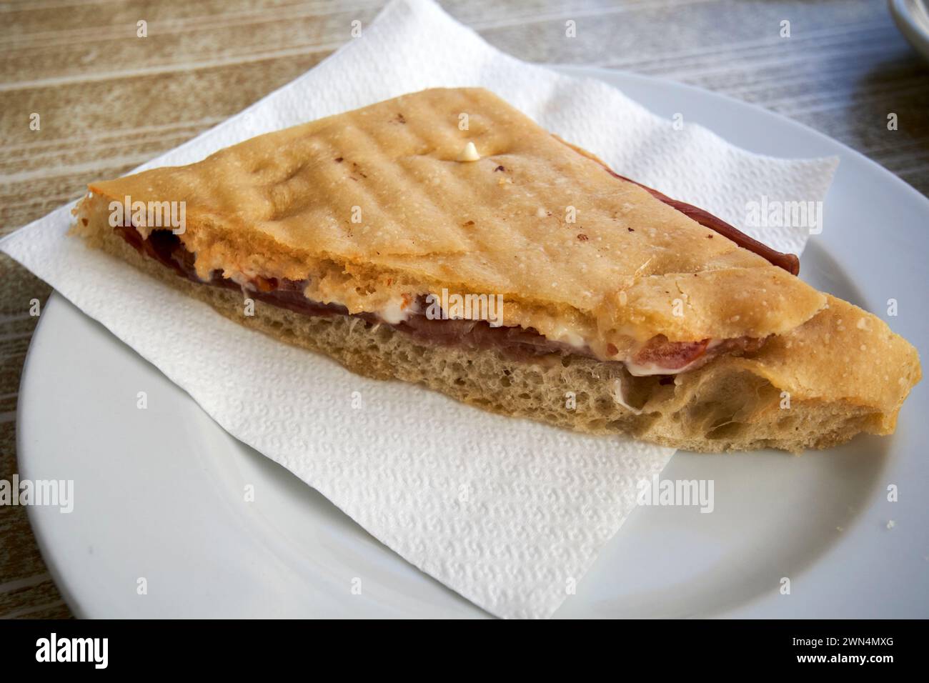 hot serrano ham and cheese flatbread sandwich in a cafe in Corralejo, fuerteventura, Canary Islands, spain Stock Photo