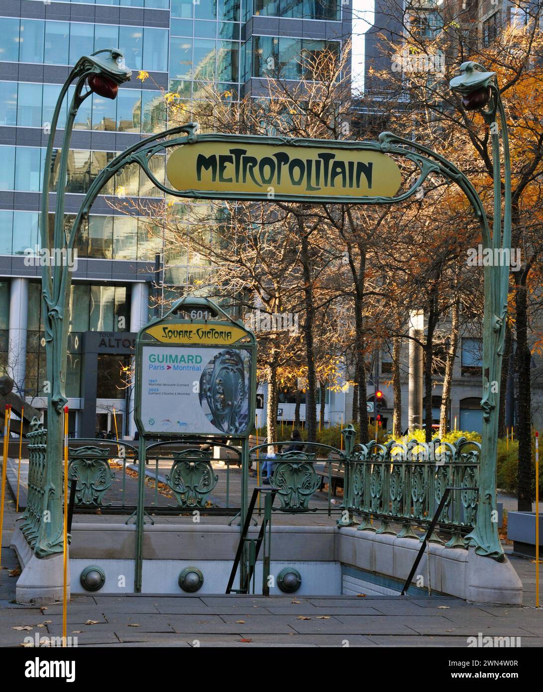 An Art Noveau subway entrance originally from the Paris Métro graces the Saint-Antoine entrance at the Montreal Métro's Victoria Square station. Stock Photo