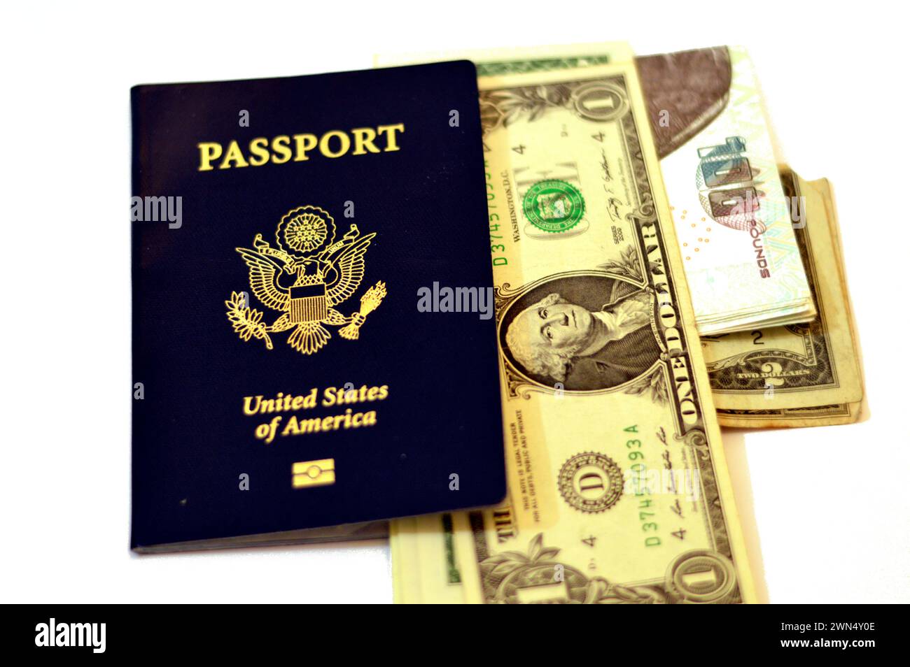 Egyptian money pounds and USD American dollars with The United States of American passport, passports are issued to the American citizens and national Stock Photo