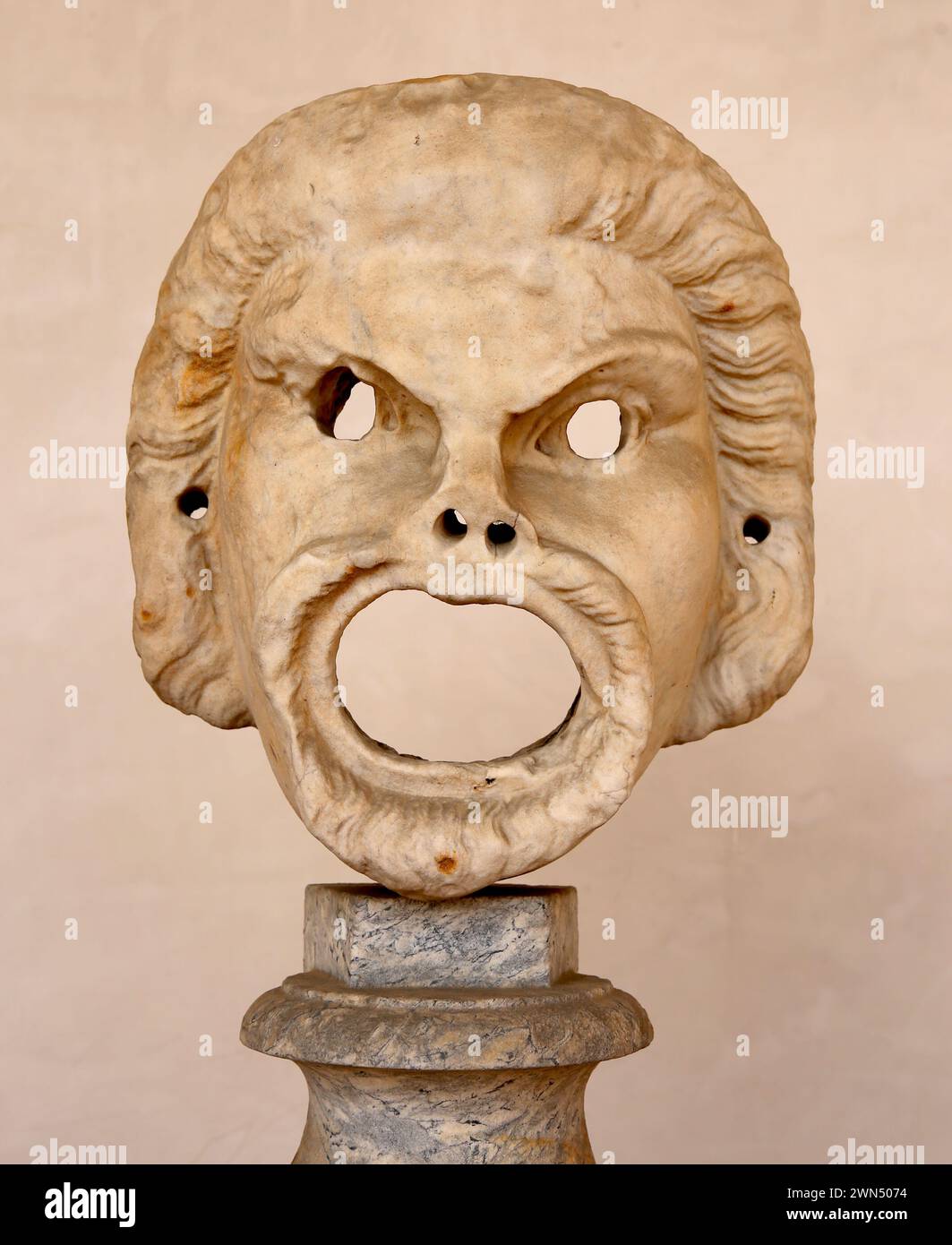 Roman theatre. Male commic mask. White marble. 2nd century A.D. Unknown provenance. National Roman Museum (Baths of Diocletian). Rome. Italy. Stock Photo