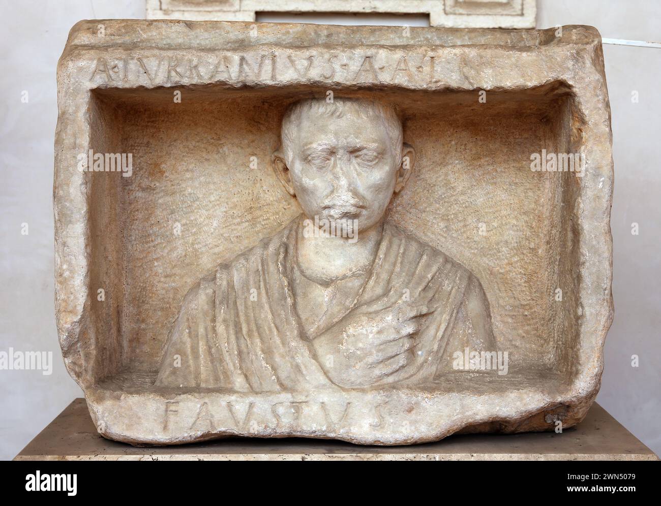 Funeral stele of a freedman Aulus Turranius Faustus. 30-13 B.C. Provenance is not known. National Roman Museum (Baths of Diocletian). Rome. Italy. Stock Photo