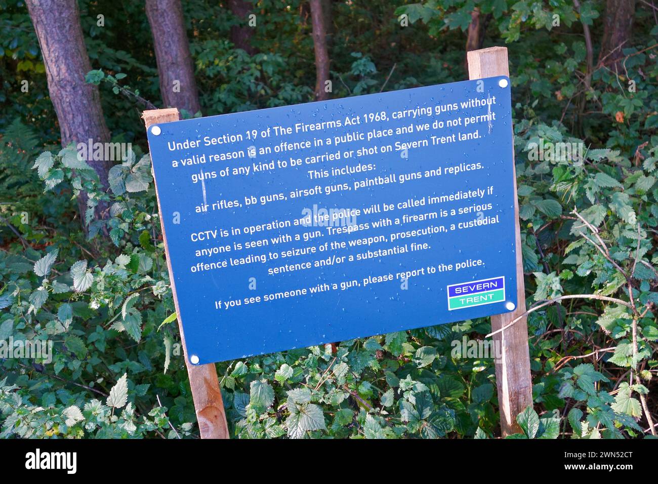 Sign erected by Severn Trent Water Authority about carrying guns in a