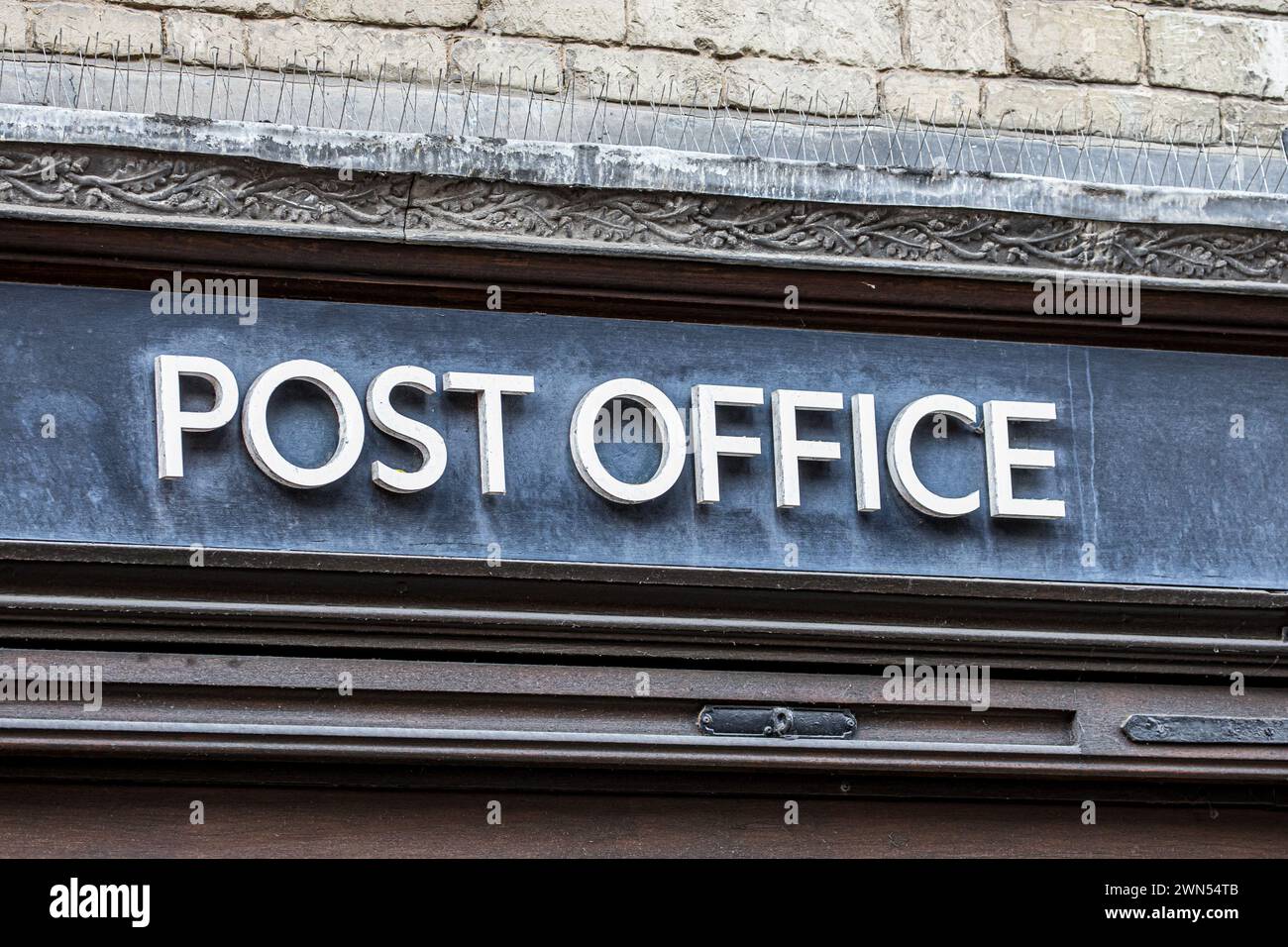 Local branch post office Royal Mail sign Stock Photo