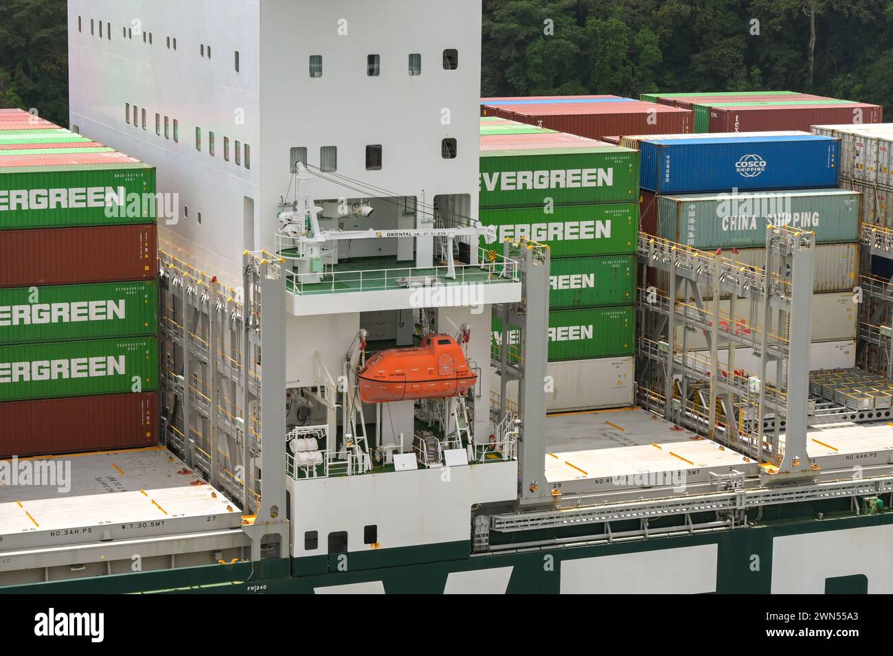 Panama Canal, Panama - 23 January 2024: Emergency lifeboat alongside the bridge of a container ship Stock Photo