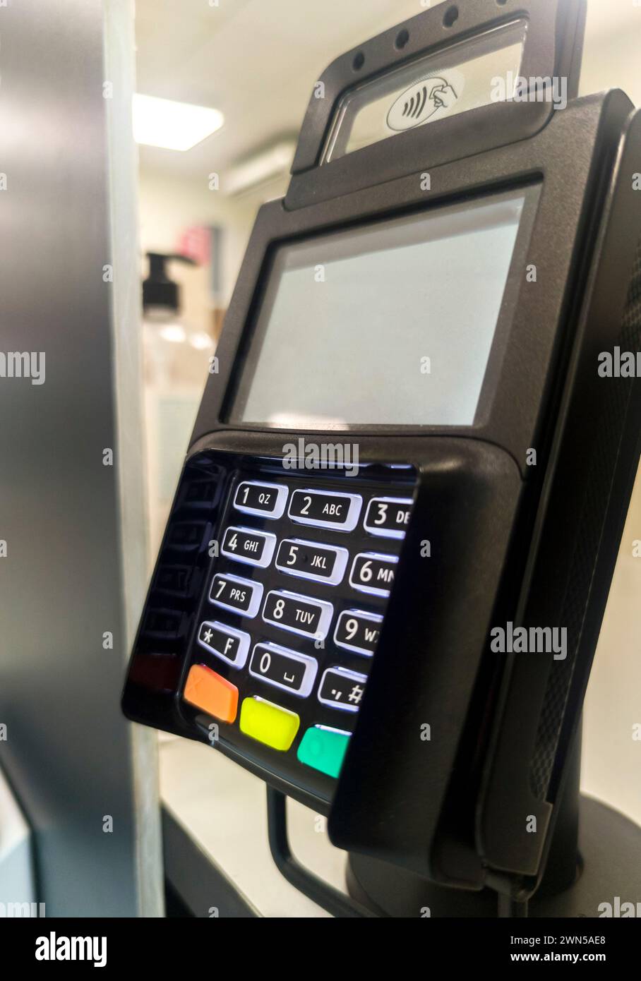 Payment terminal fixed to a counter-top. Focus numeric keyboard Stock ...