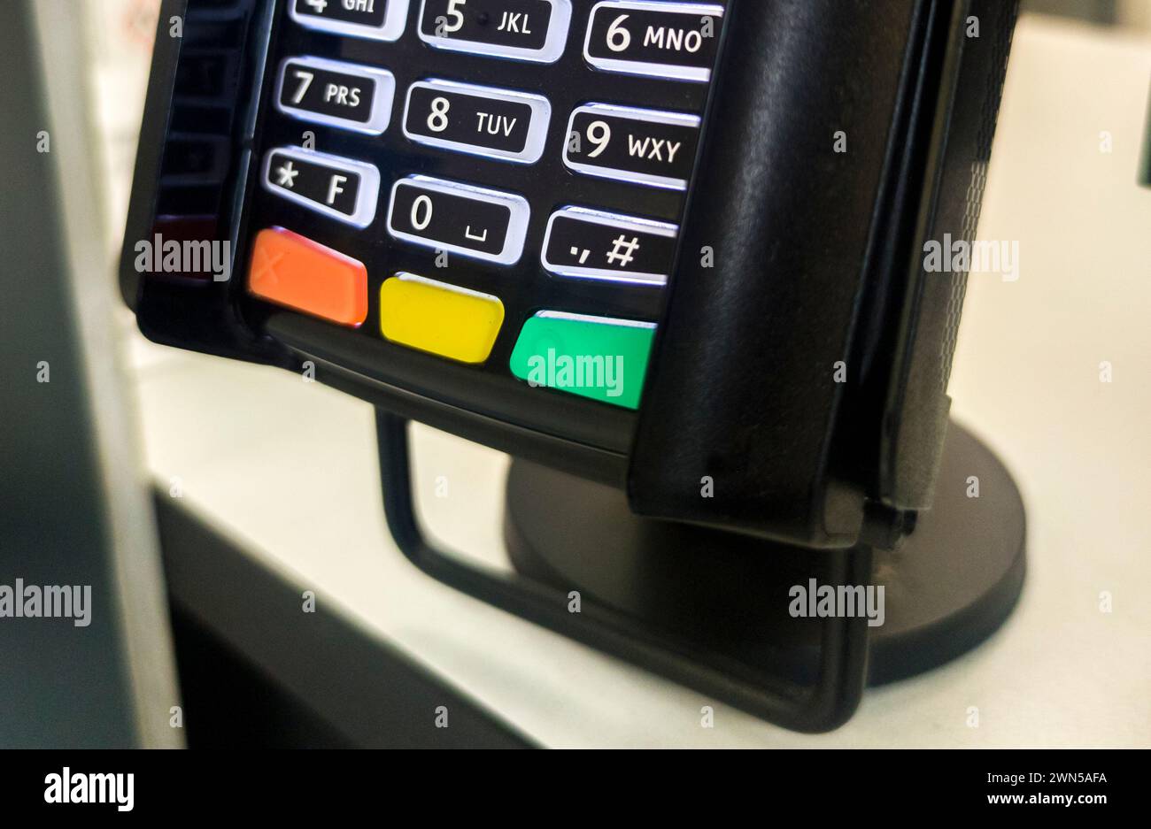 Payment terminal fixed to a counter-top. Focus numeric keyboard Stock ...