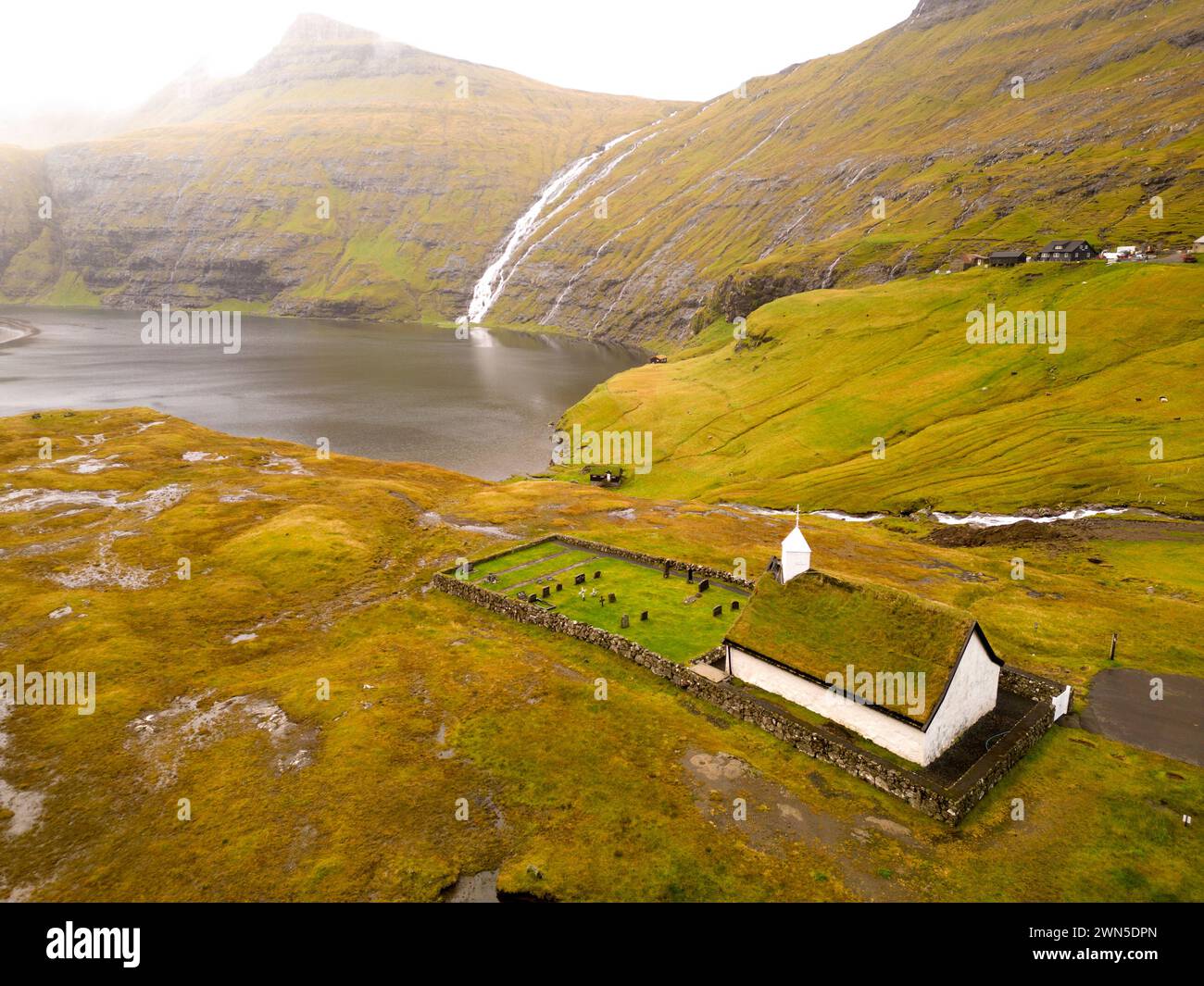 Aerial view of Saksun church and scenery of the Faroe islands Stock Photo