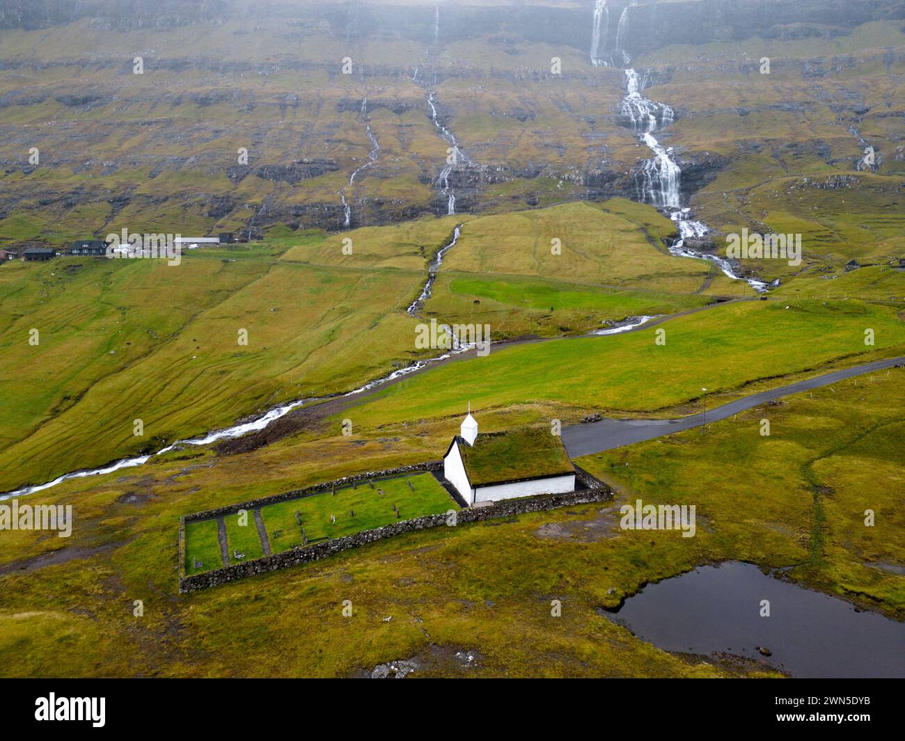 Aerial view of Saksun church and scenery of the Faroe islands Stock Photo