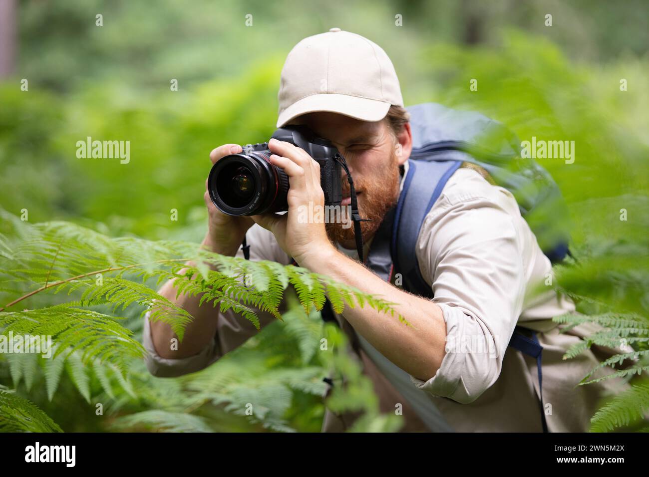 Hispanic young man trekking hi-res stock photography and images - Alamy