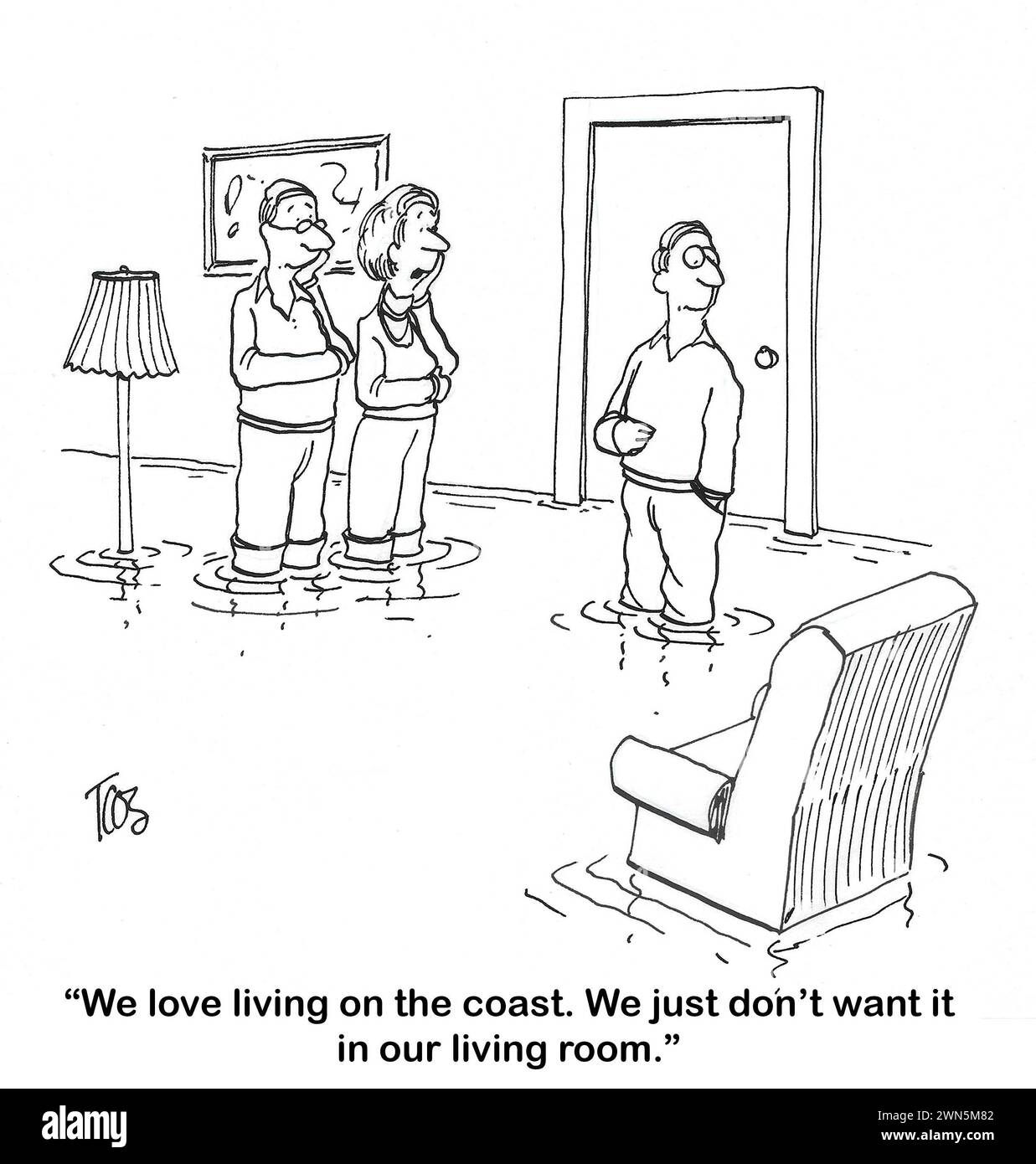 BW cartoon showing that the coastal waters have entered the couple's living room. Stock Photo