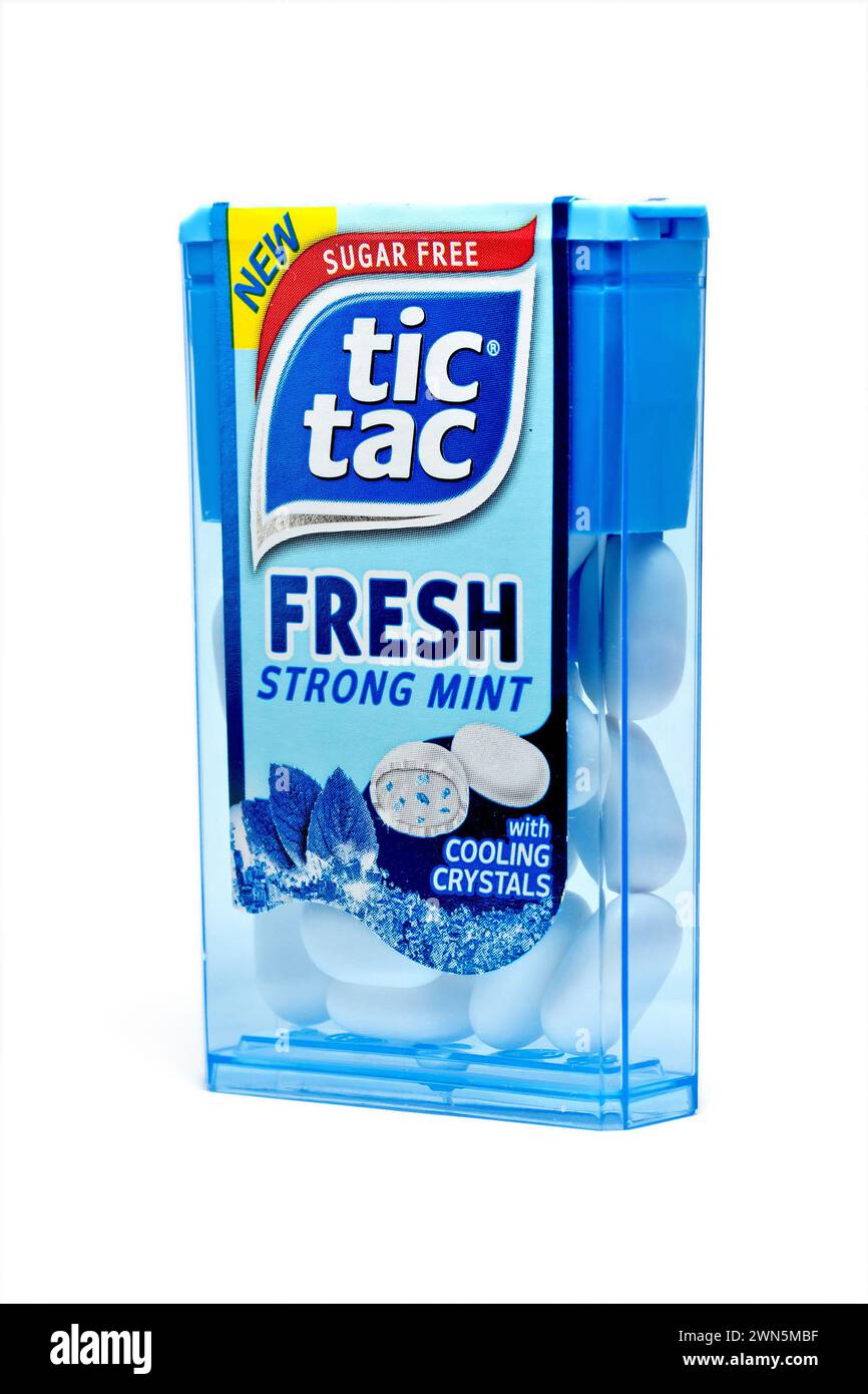 Close up of an unopened pack of sugar-free, fresh strong mint Tic Tac with cooling crystals, isolated against a white background Stock Photo