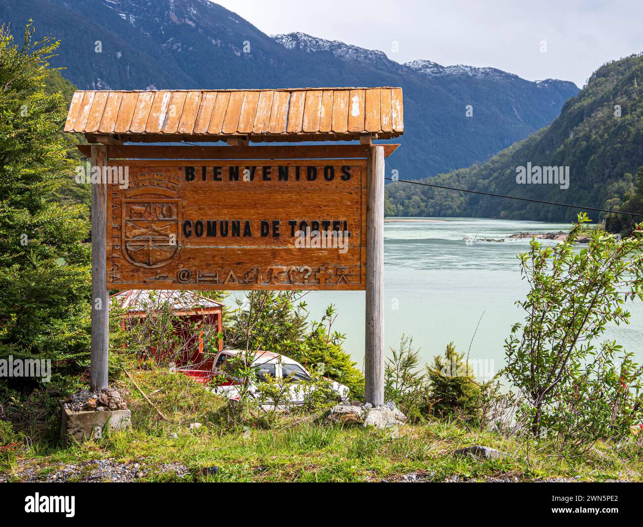Baker Rood Welcome sign to village Caleta Tortel, at river Rio Baker, road ...