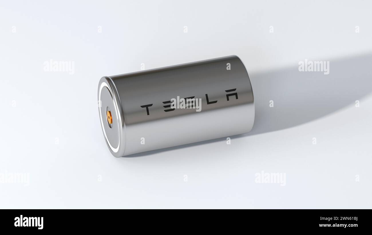 one Lithium-ion 4680 Tesla battery with logo, one High-capacity accumulator, tables cell, Energy Storage, electric vehicle production, High Tech Autom Stock Photo