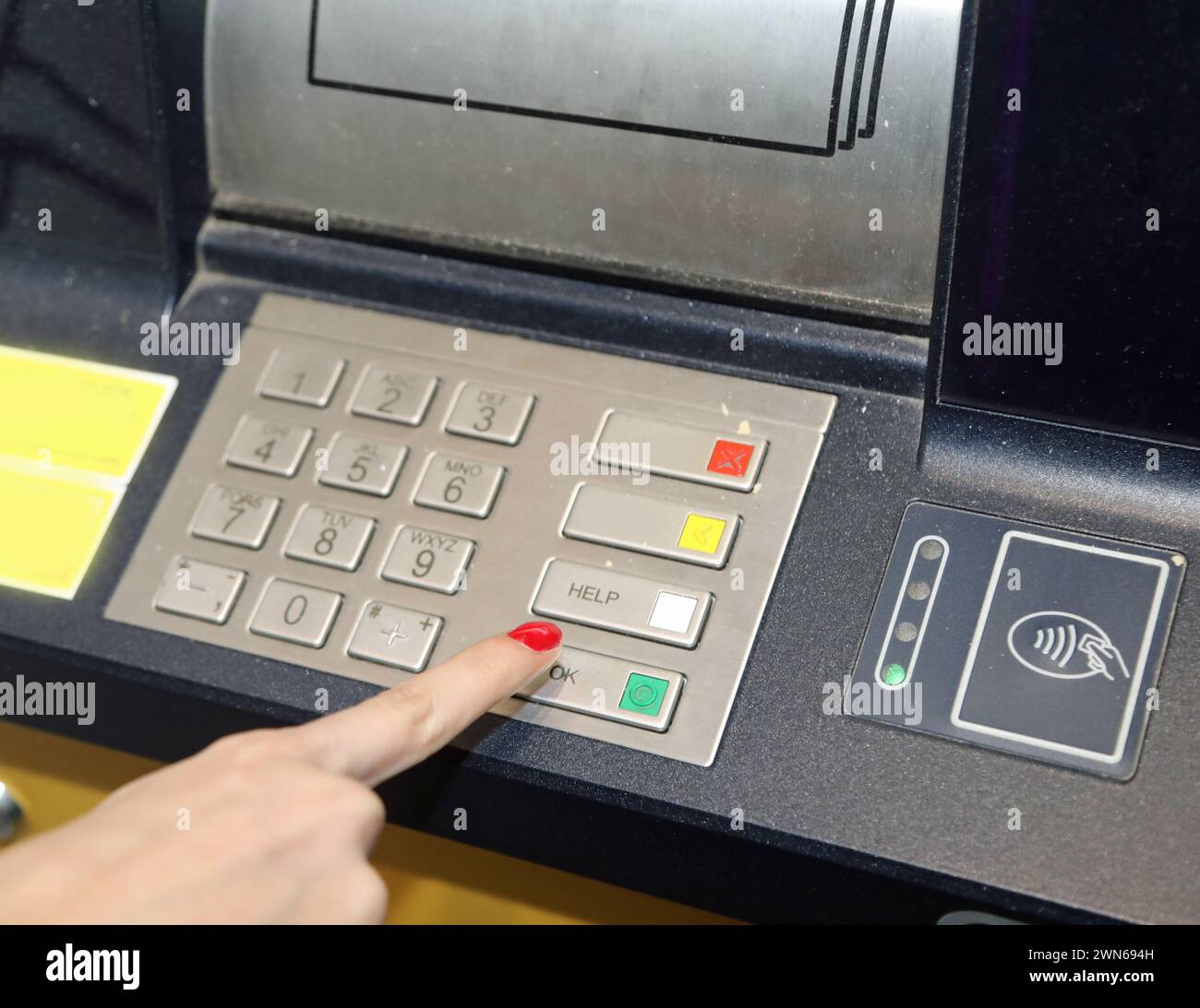 Atm numeric keypad hand hi-res stock photography and images - Alamy