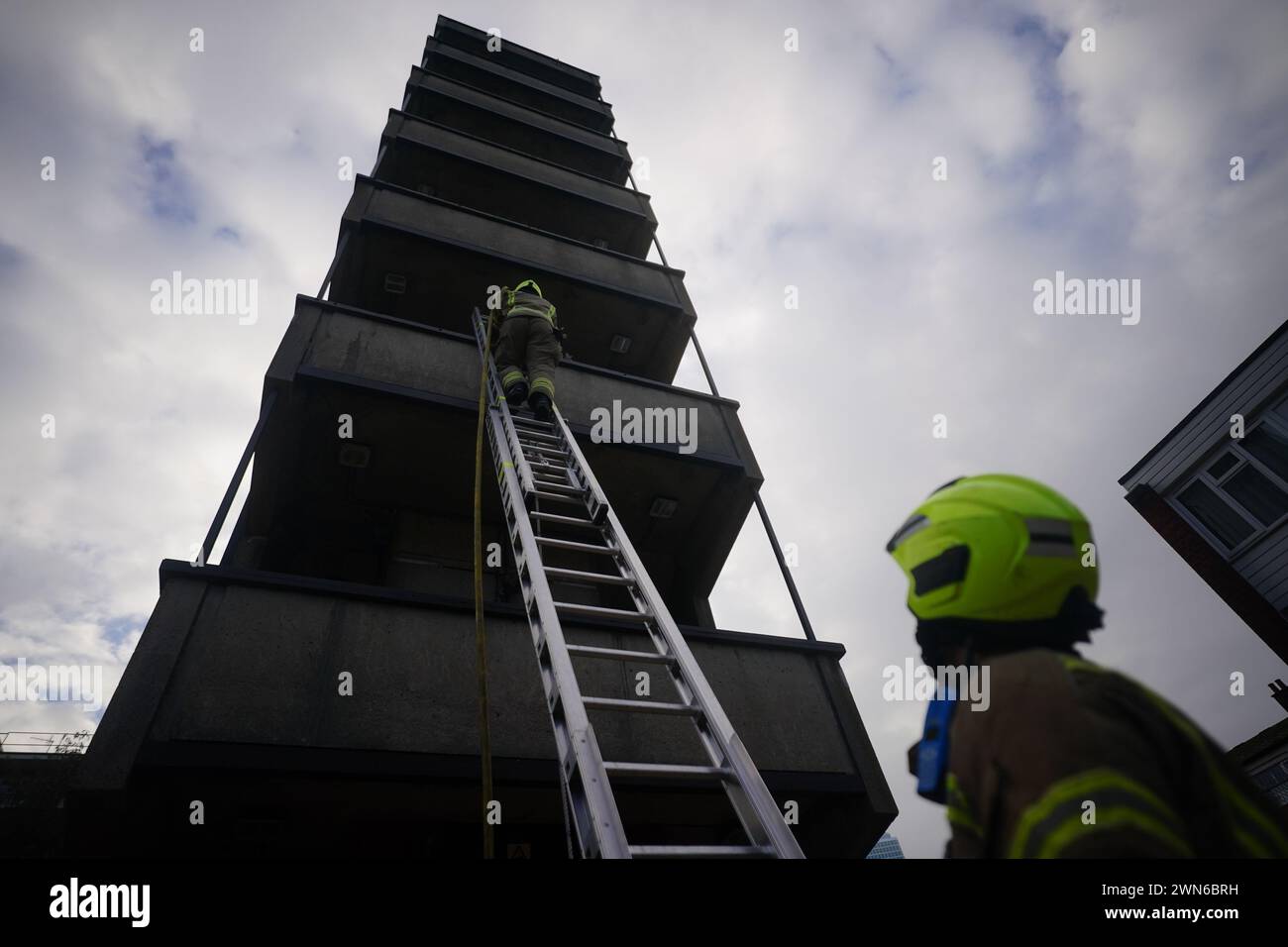 Firefighter officers run through a practice drill during a London Fire Brigade facility at Poplar Fire Station in London. Picture date: Friday December 1, 2023. Stock Photo
